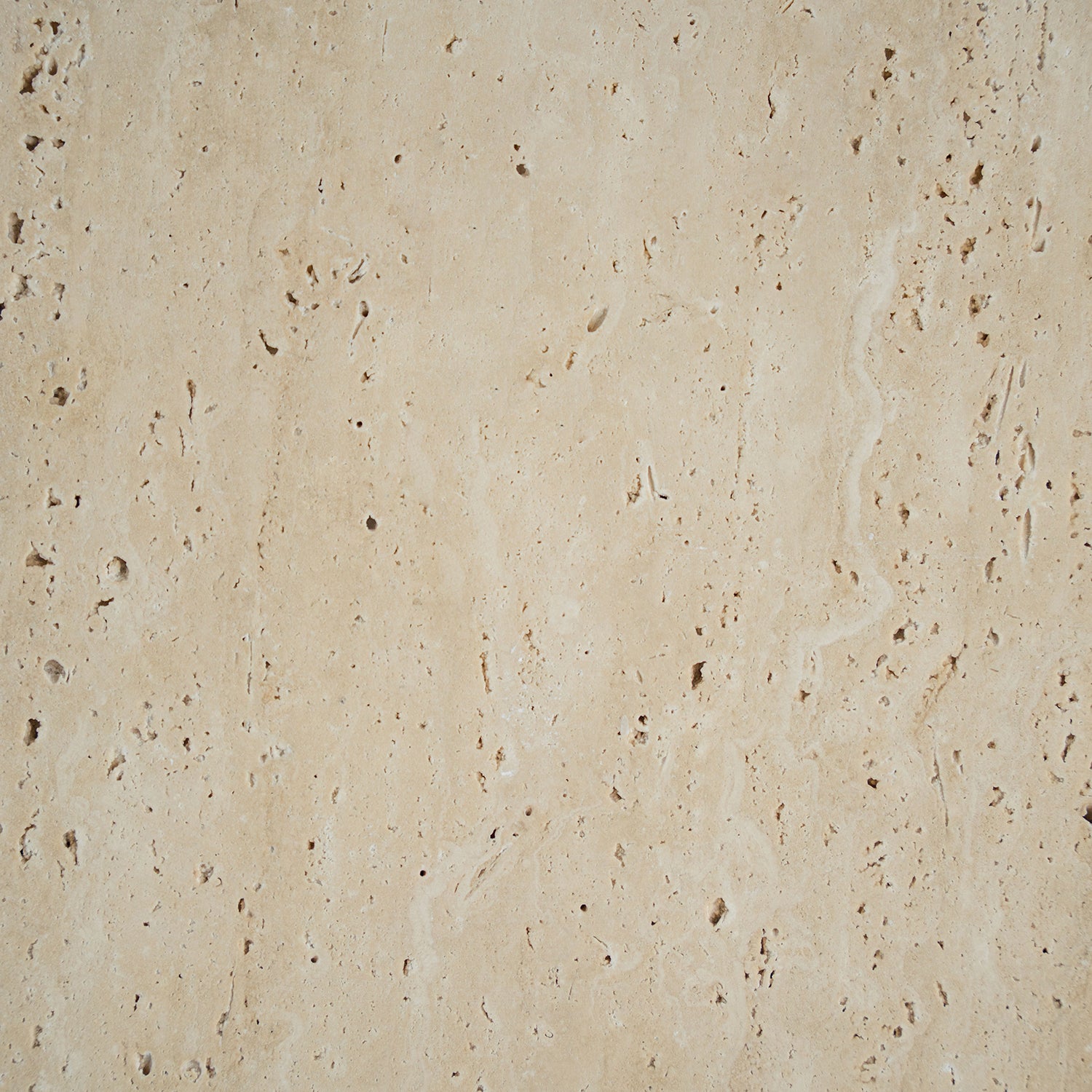 Travertine side table with sculptural zigzag design