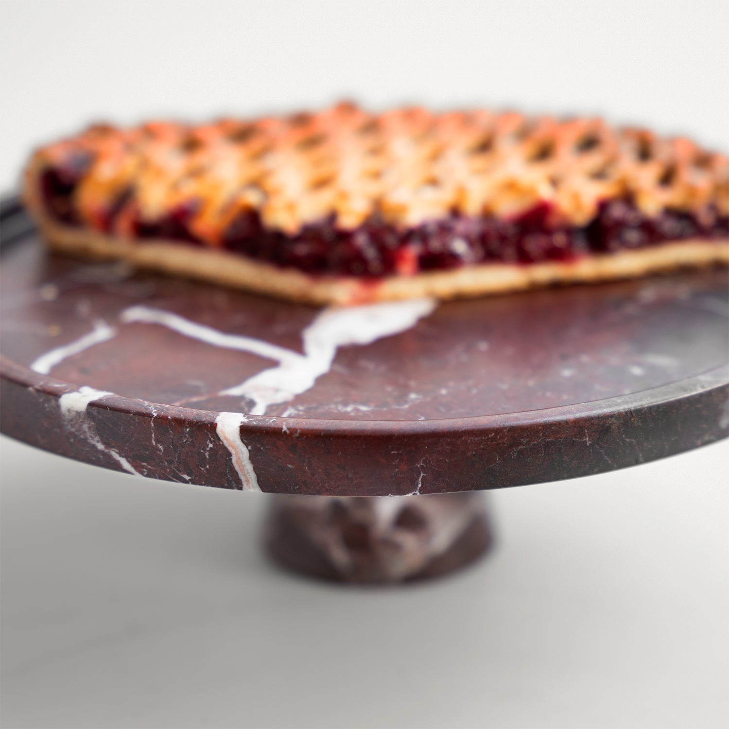 Rosso Levanto marble cake stand with pedestal base