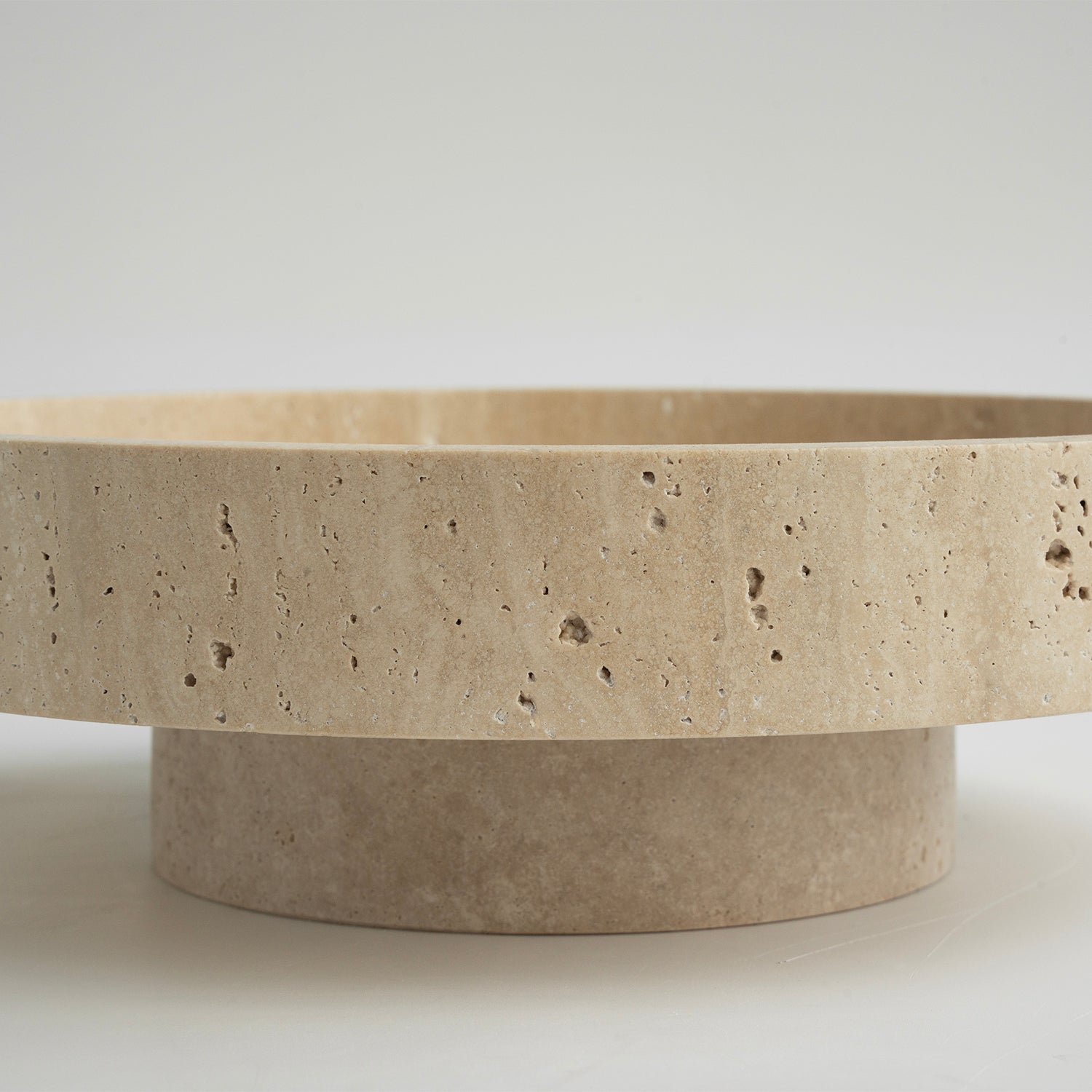 Decorative travertine fruit bowl made from natural stone