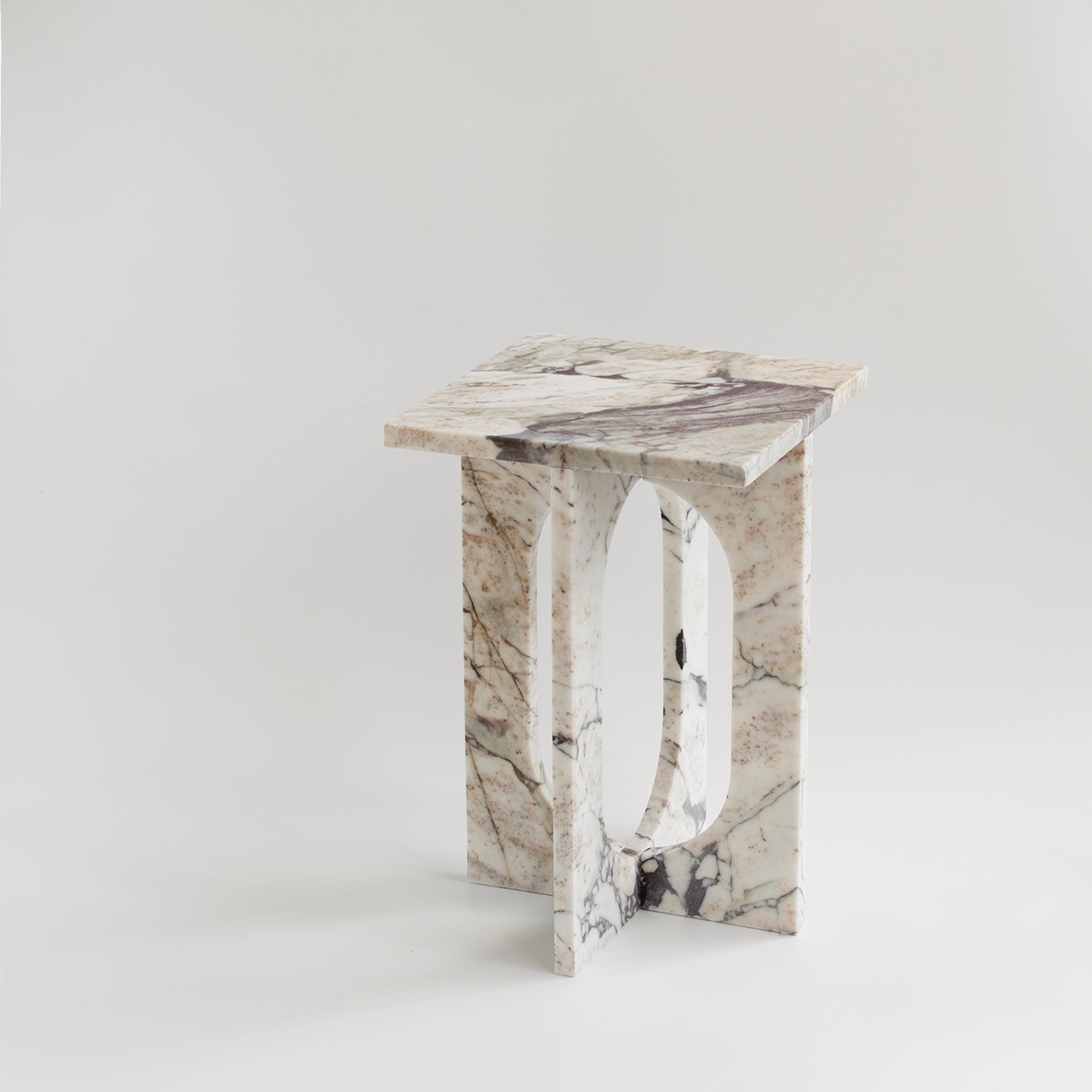 Calacatta marble side table with smooth honed finish
