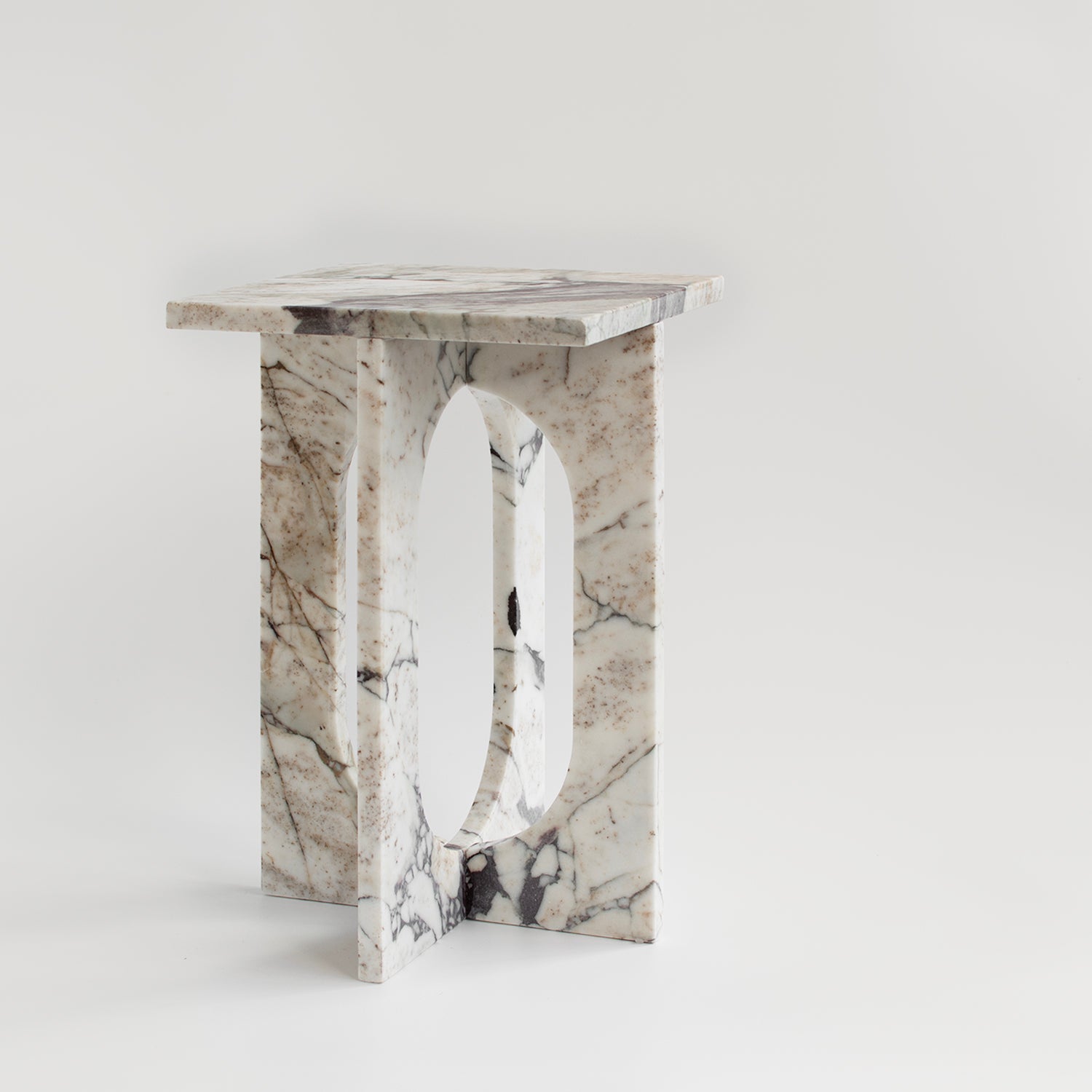 Calacatta marble side table with smooth honed finish