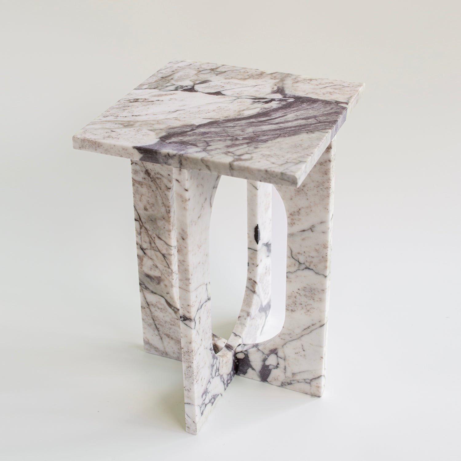 Calacatta marble side table with smooth honed finish