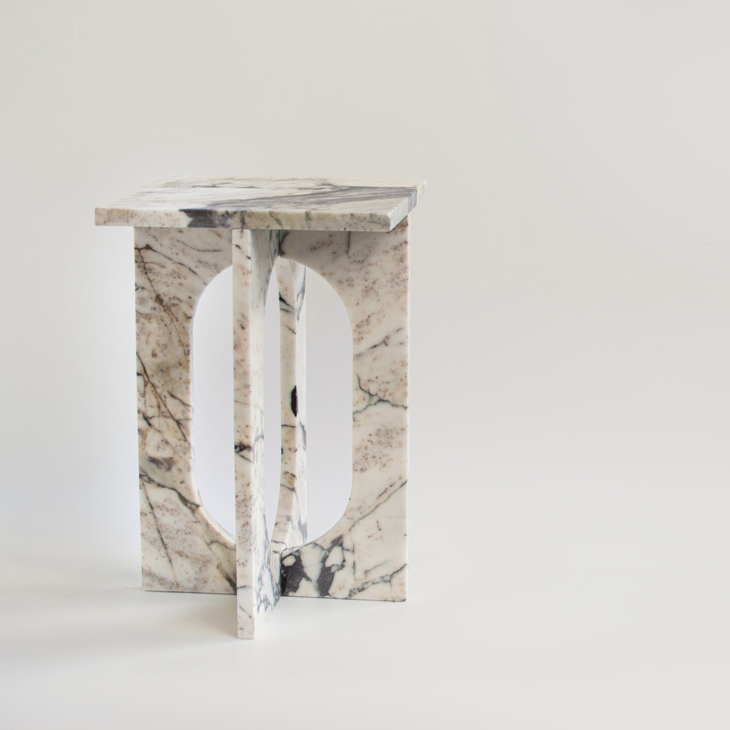 Calacatta marble side table with smooth honed finish