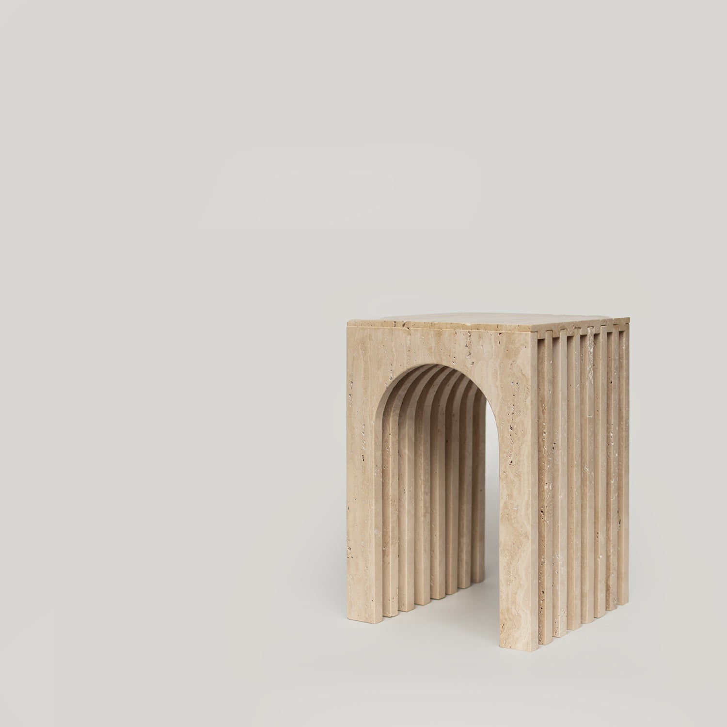 Beige travertine arch side table with marble stone finish