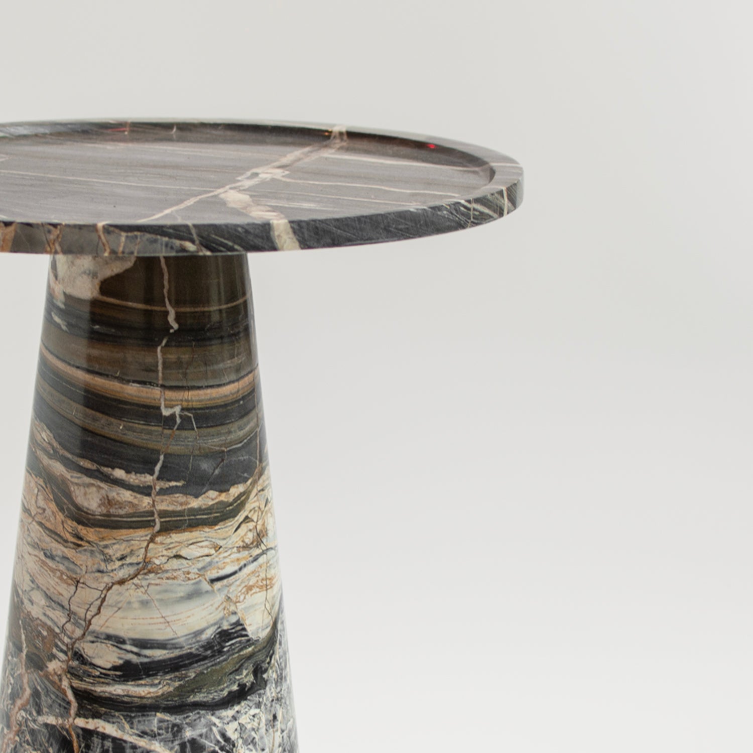 Cone side table made of Picasso marble