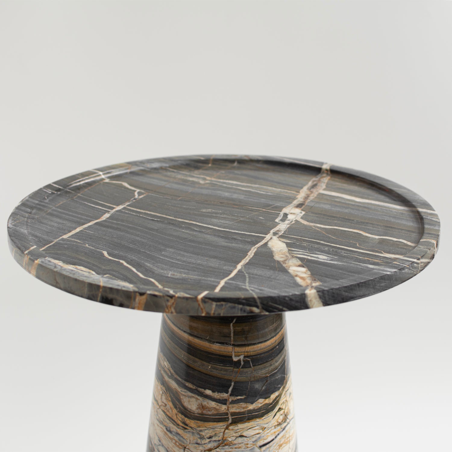 Cone side table made of Picasso marble