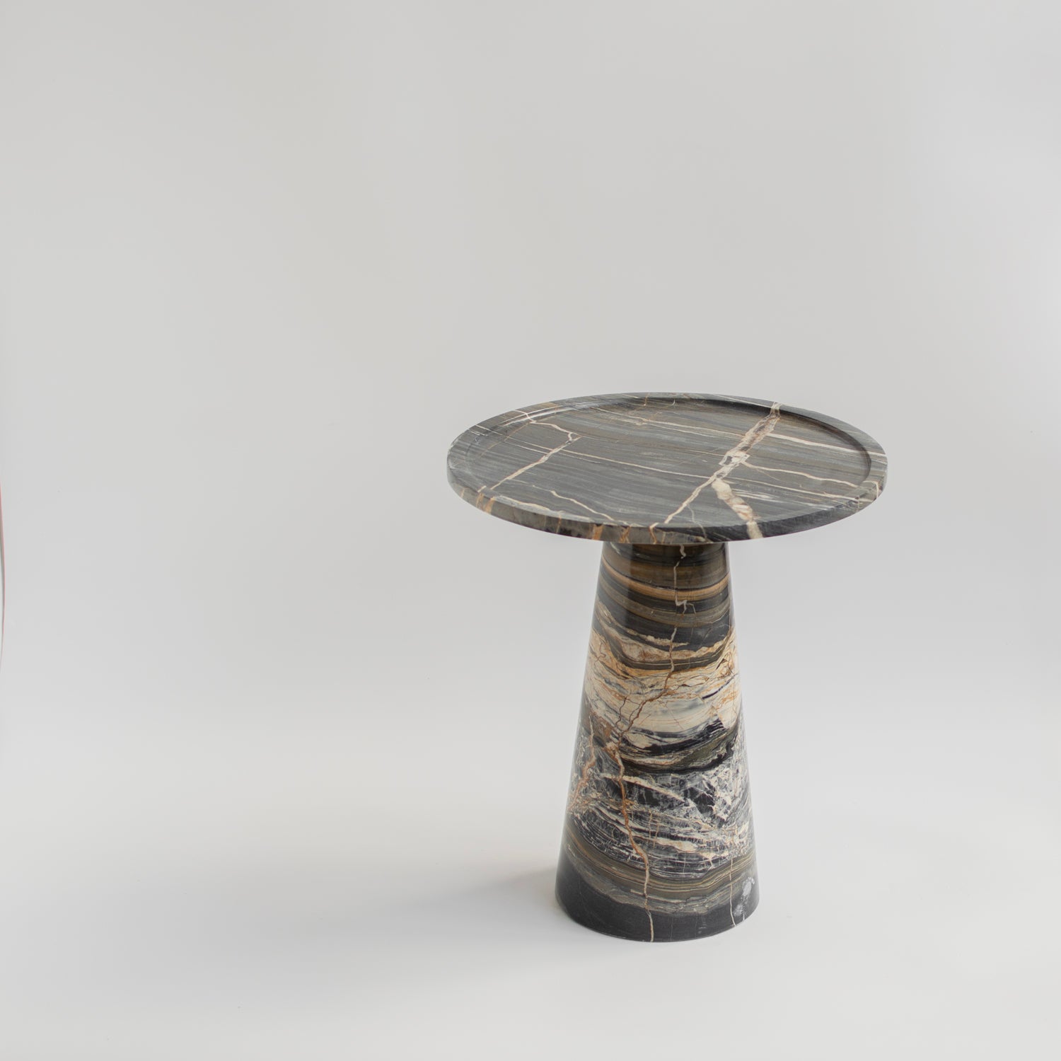 Cone side table made of Picasso marble