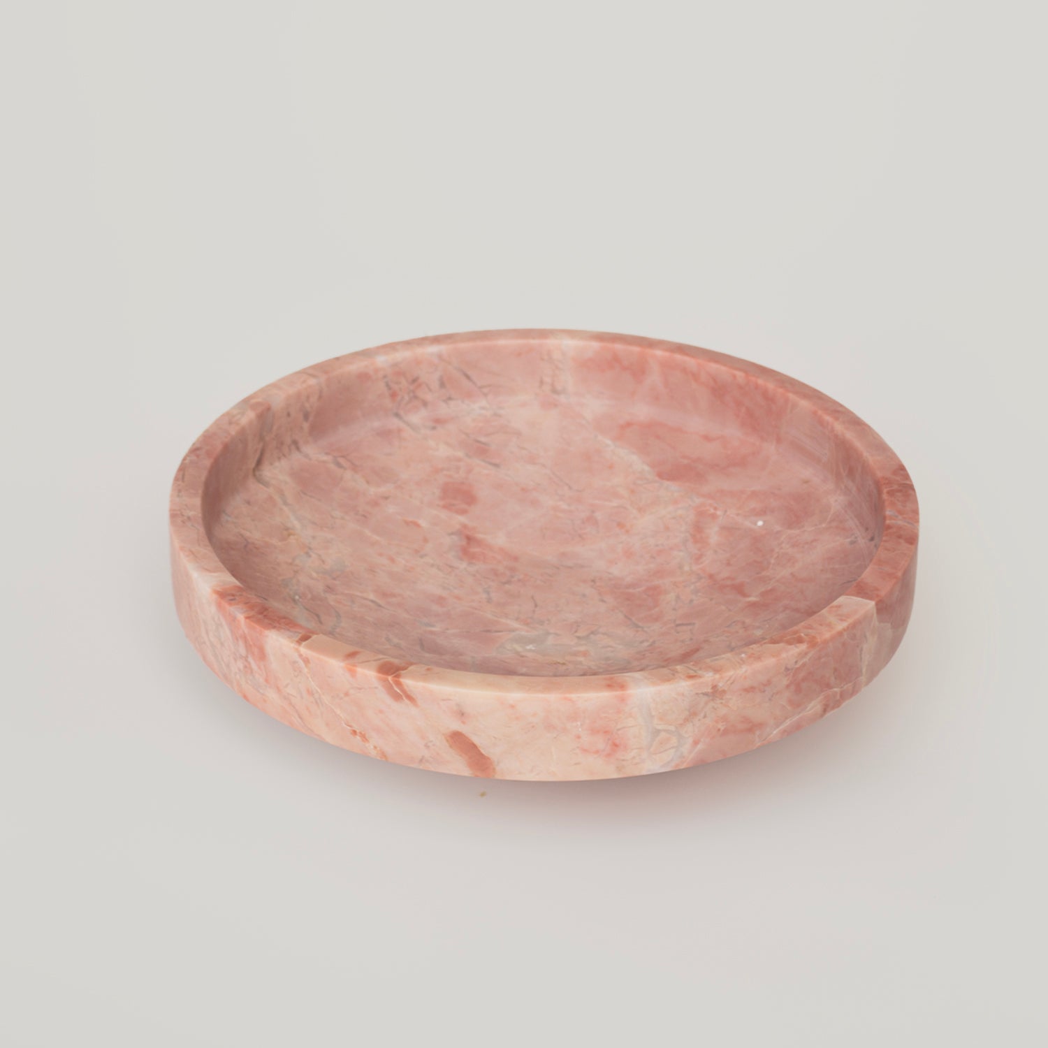 Pink marble bowl with smooth sculptural stone finish