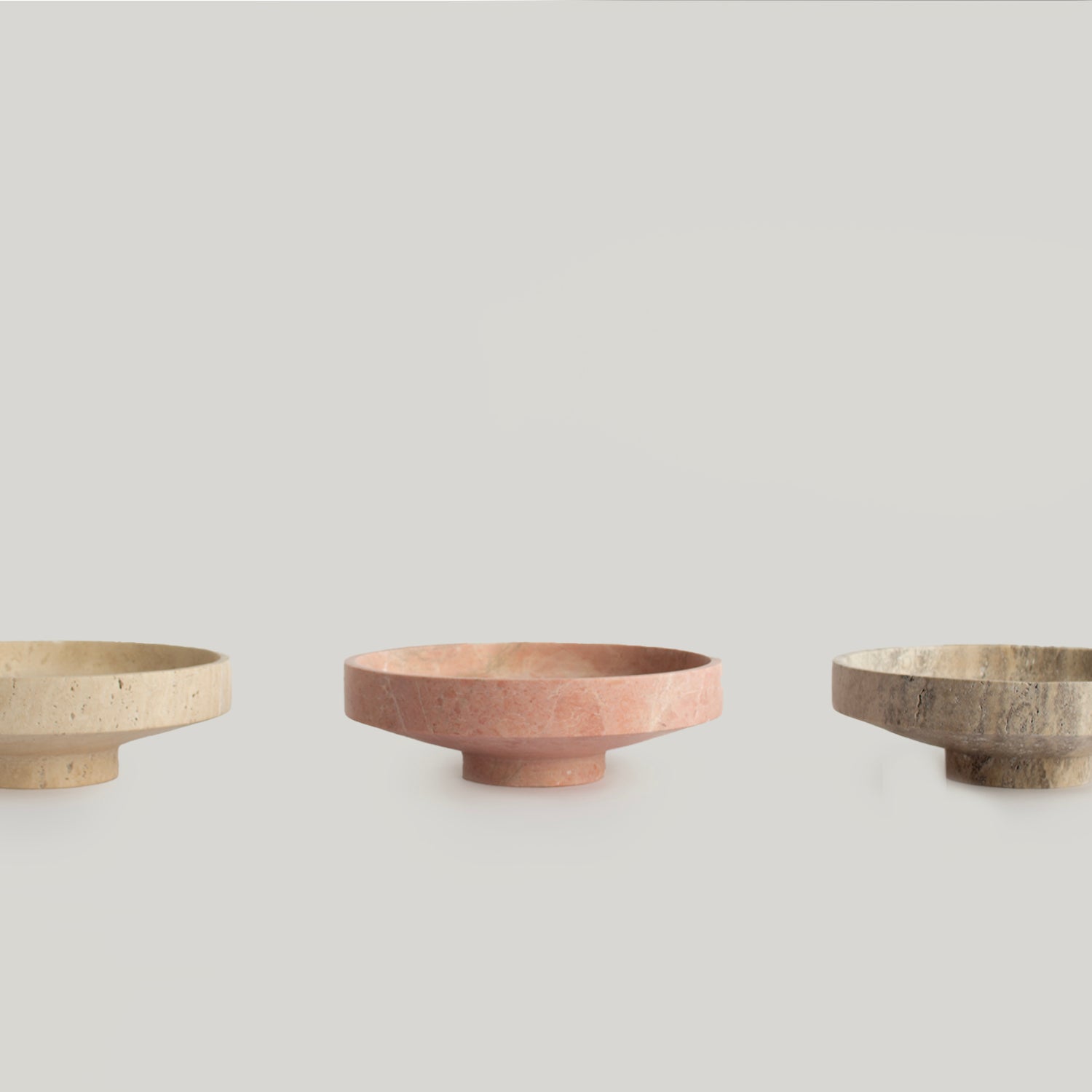 Pink marble bowl with smooth sculptural stone finish