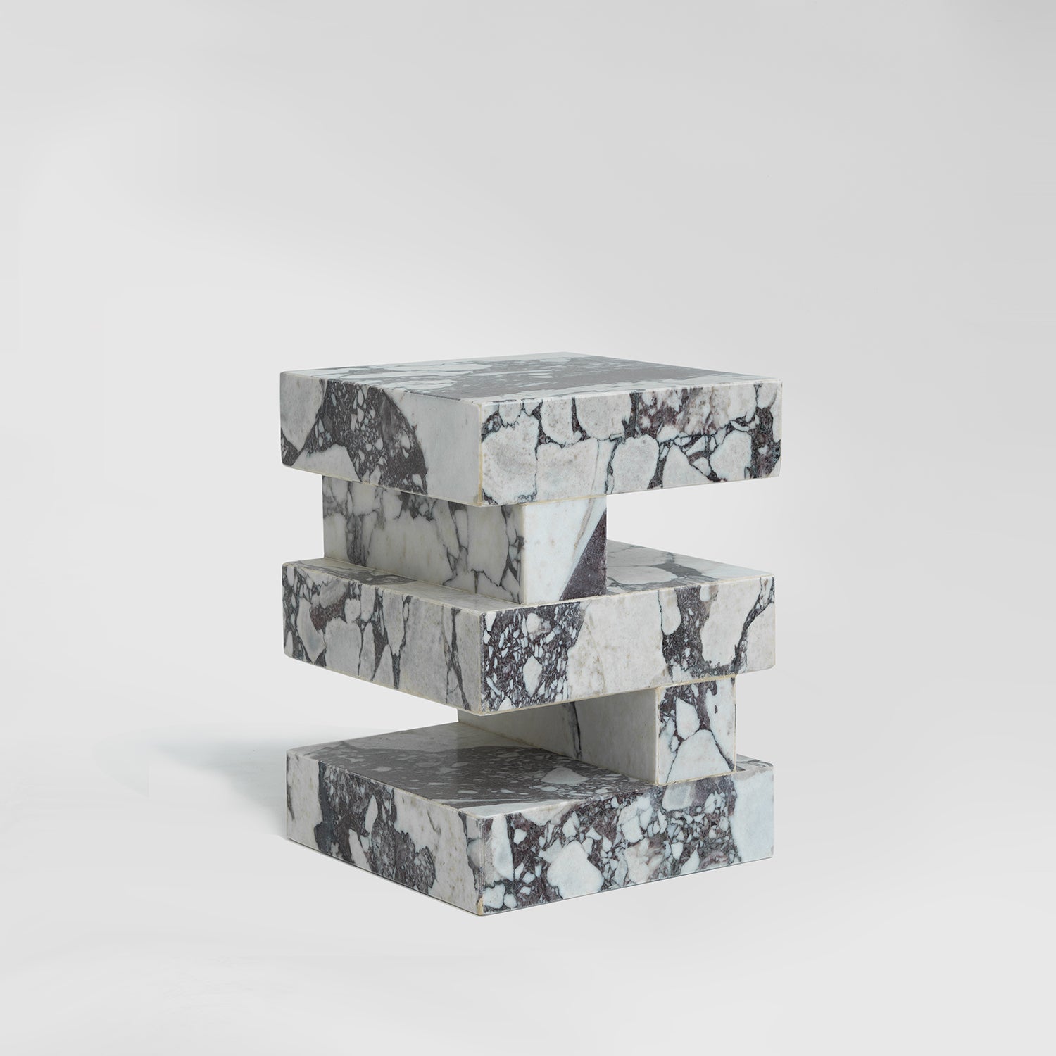 Calacatta marble side table with sculptural zigzag shape