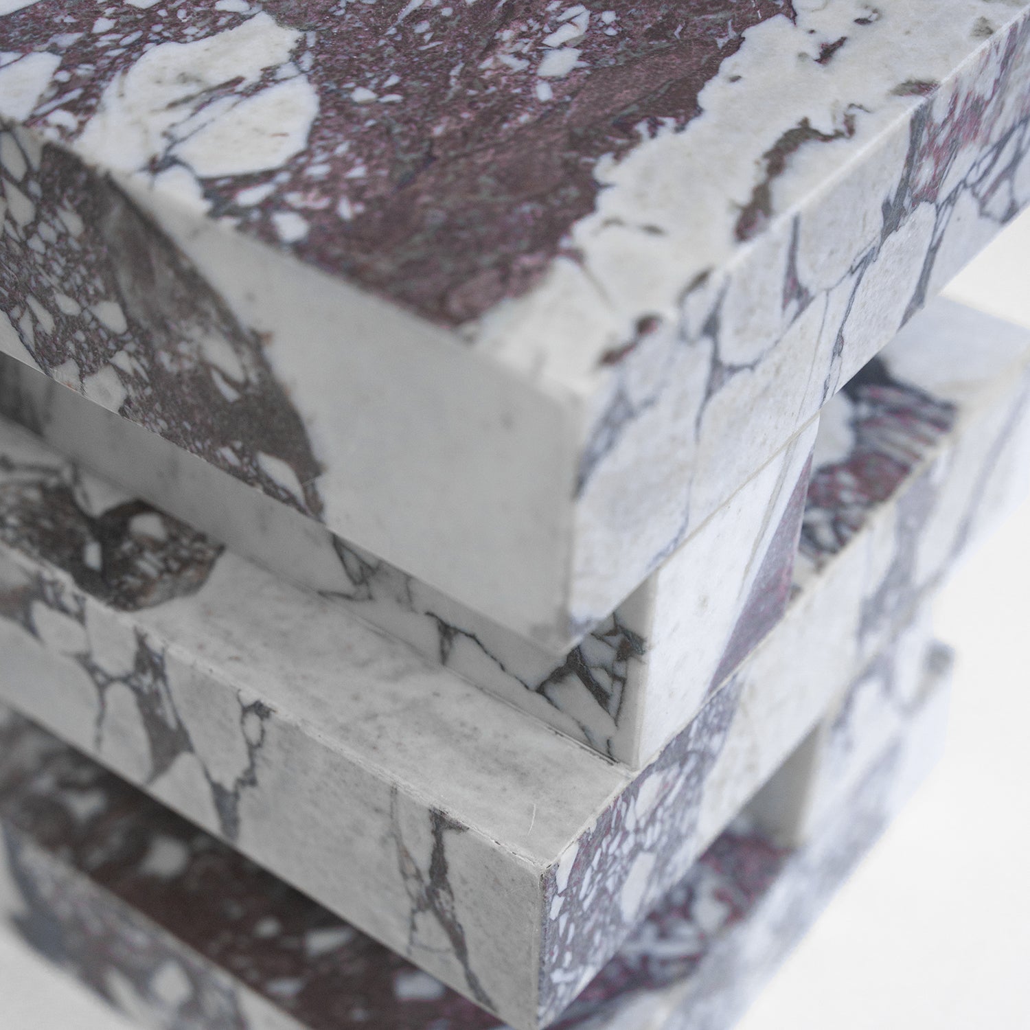 Calacatta marble side table with sculptural zigzag shape