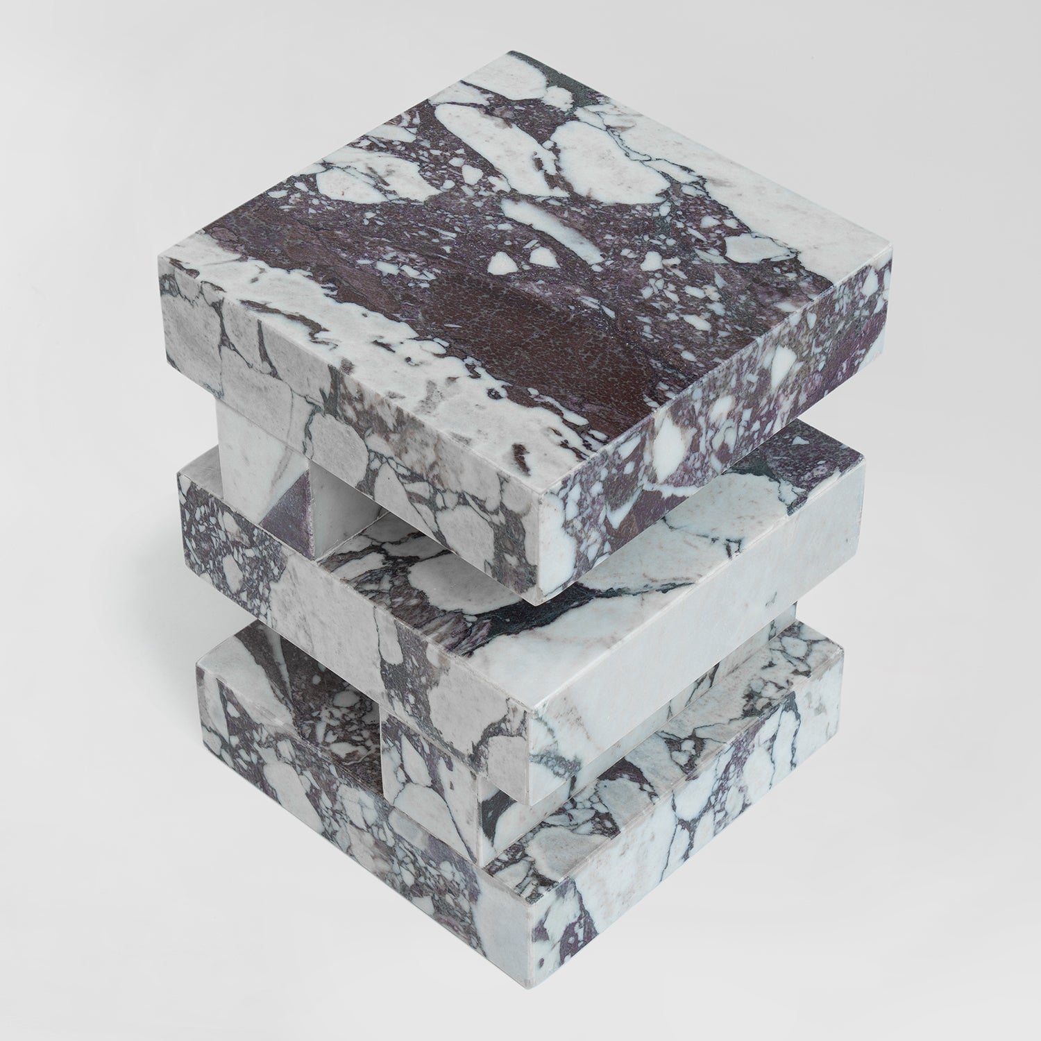 Calacatta marble side table with sculptural zigzag shape