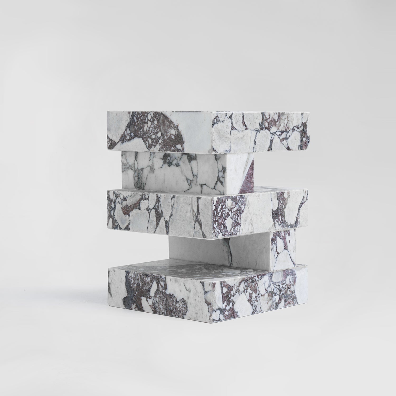 Calacatta marble side table with sculptural zigzag shape