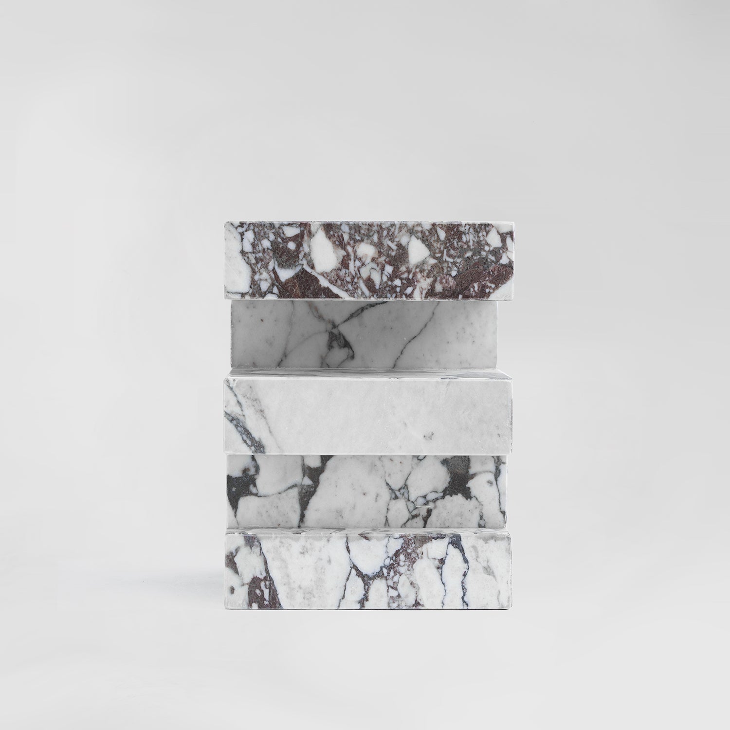 Calacatta marble side table with sculptural zigzag shape