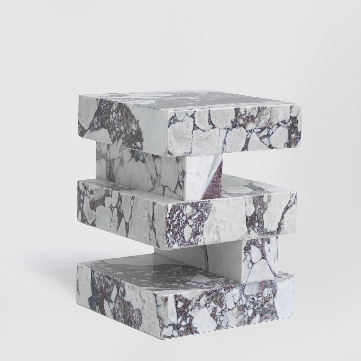 Calacatta marble side table with sculptural zigzag shape