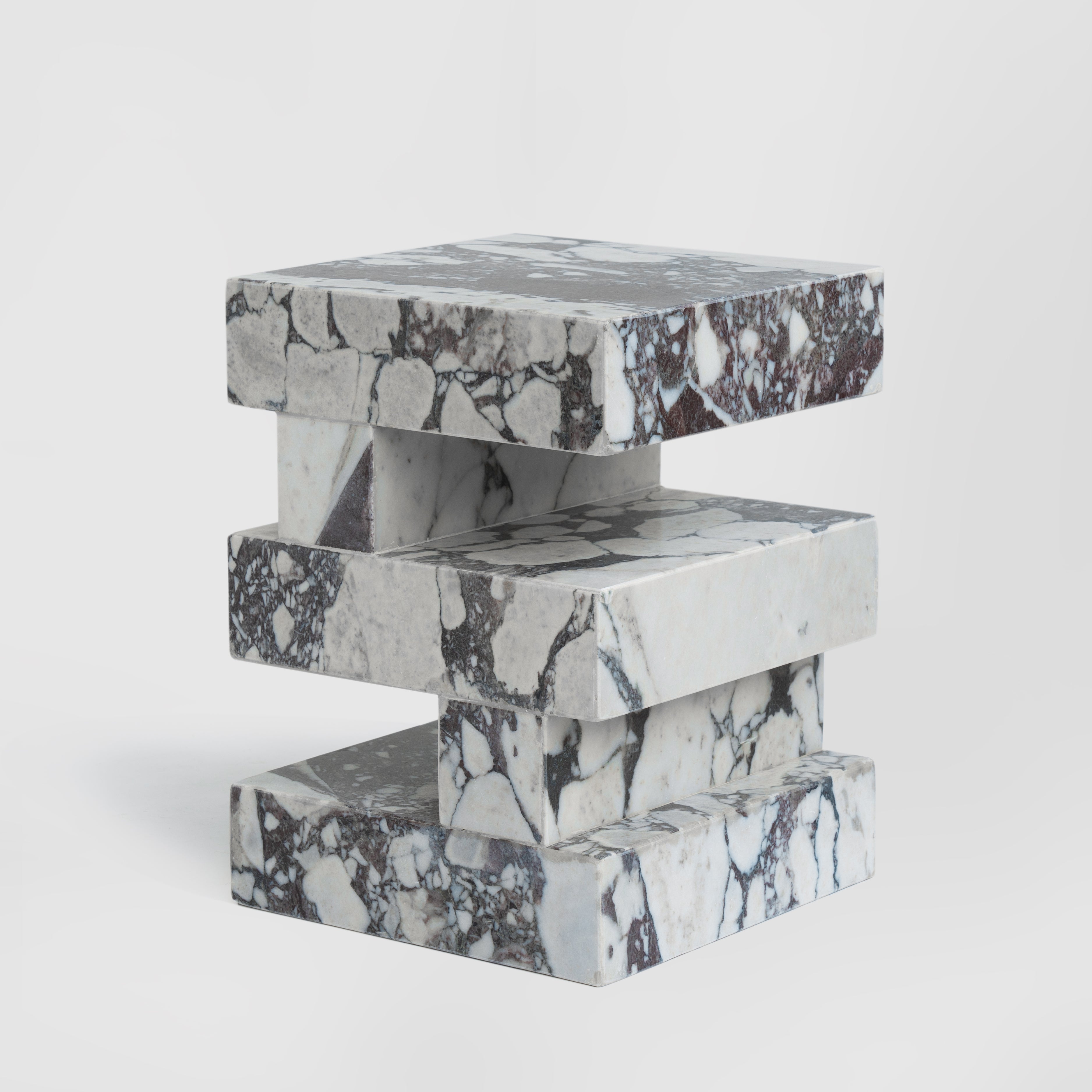 Calacatta marble side table with sculptural zigzag shape