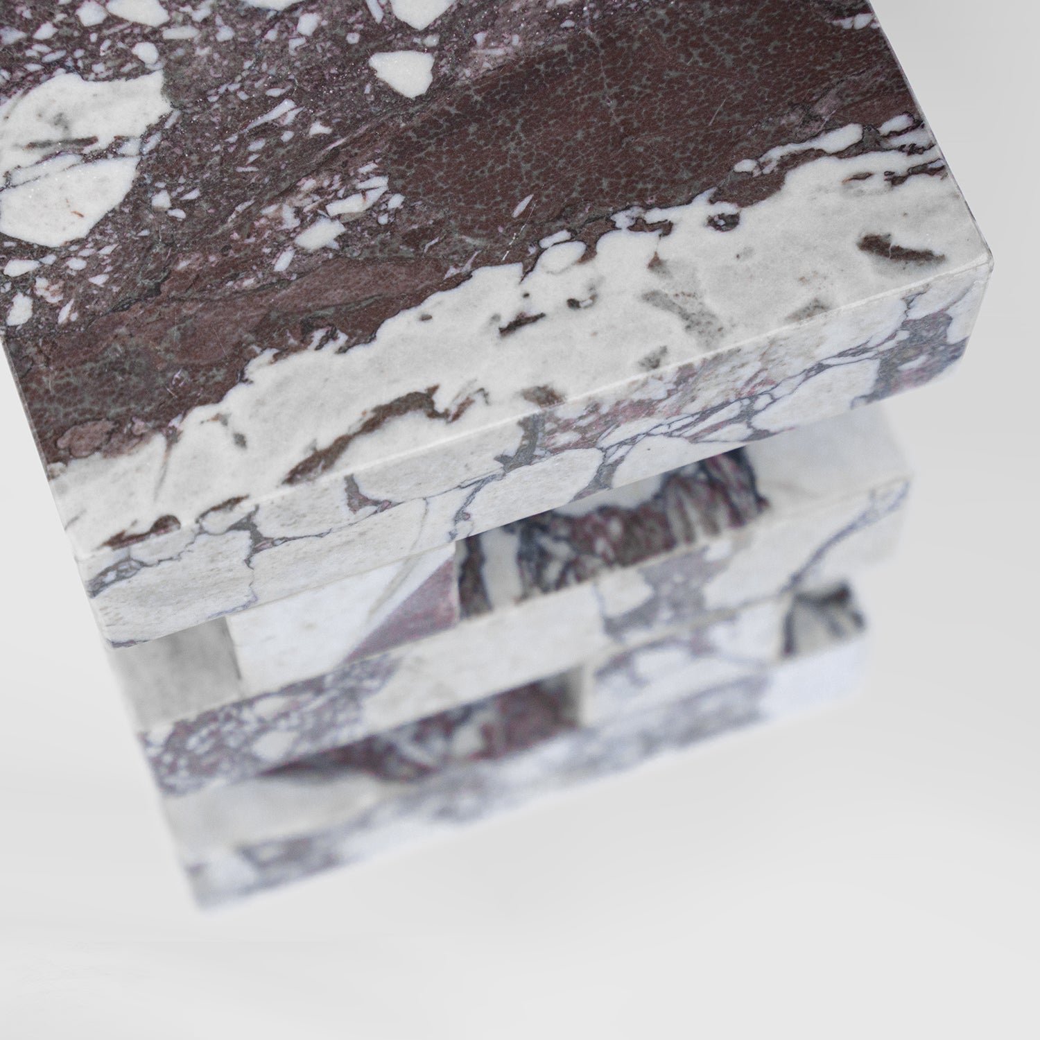 Calacatta marble side table with sculptural zigzag shape