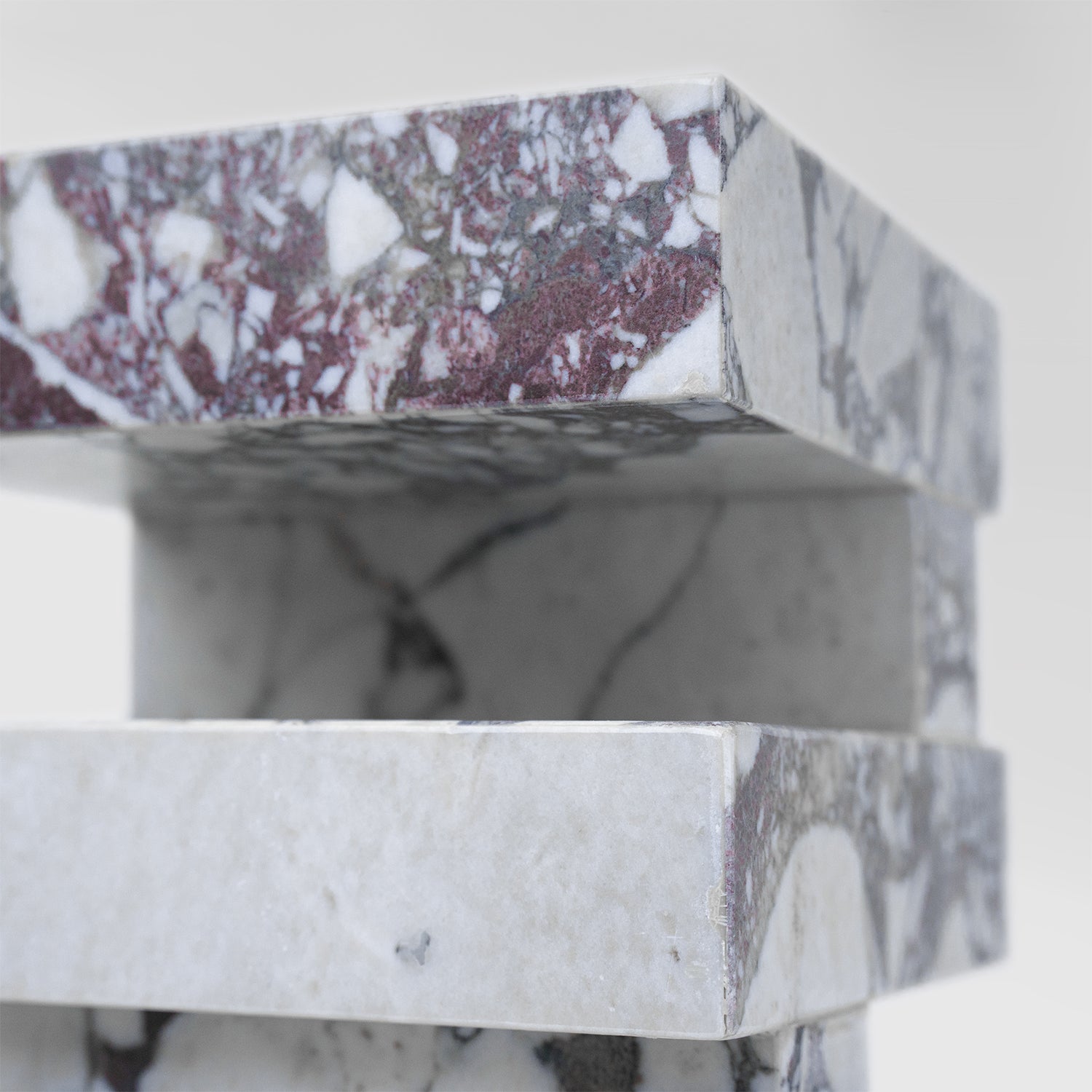 Calacatta marble side table with sculptural zigzag shape