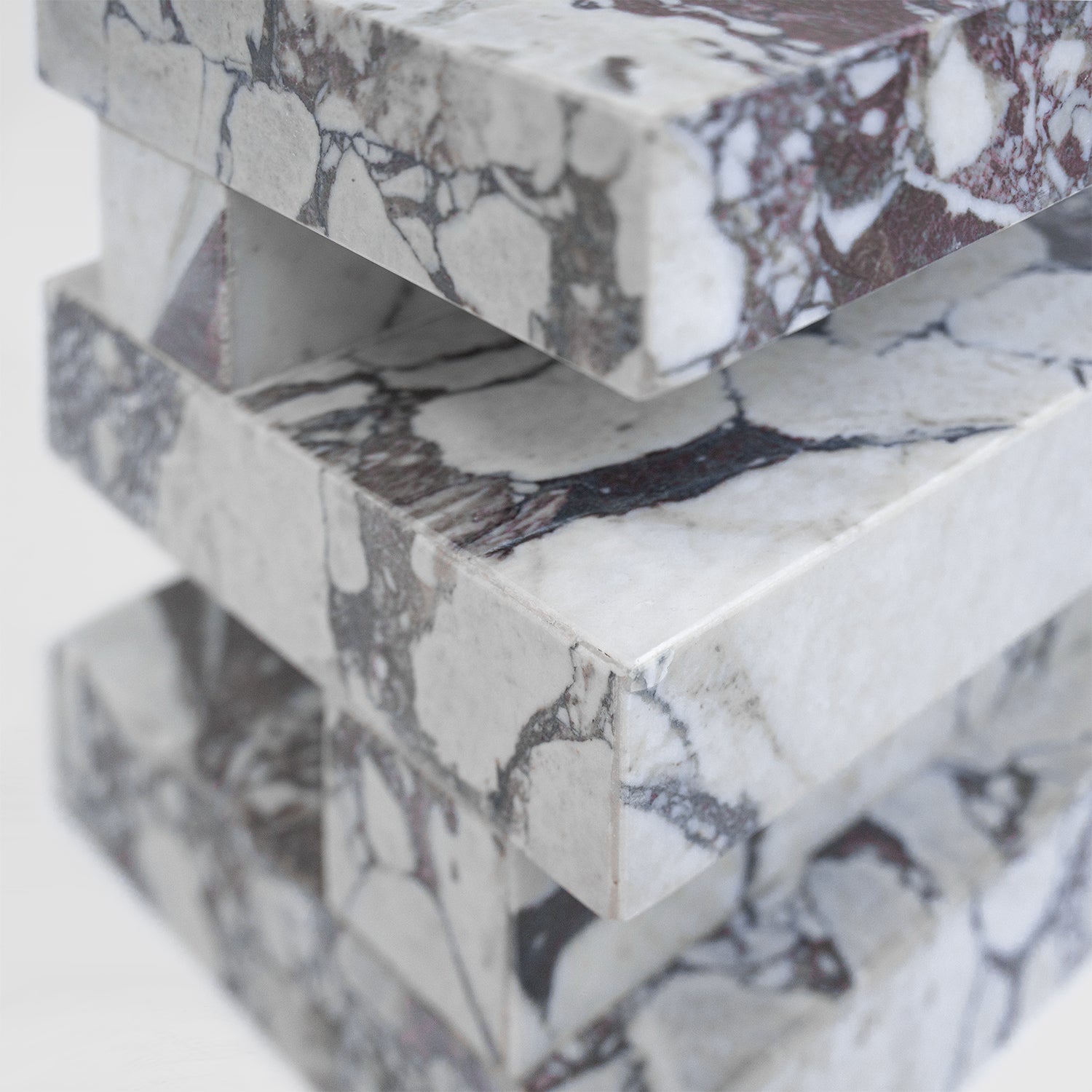 Calacatta marble side table with sculptural zigzag shape