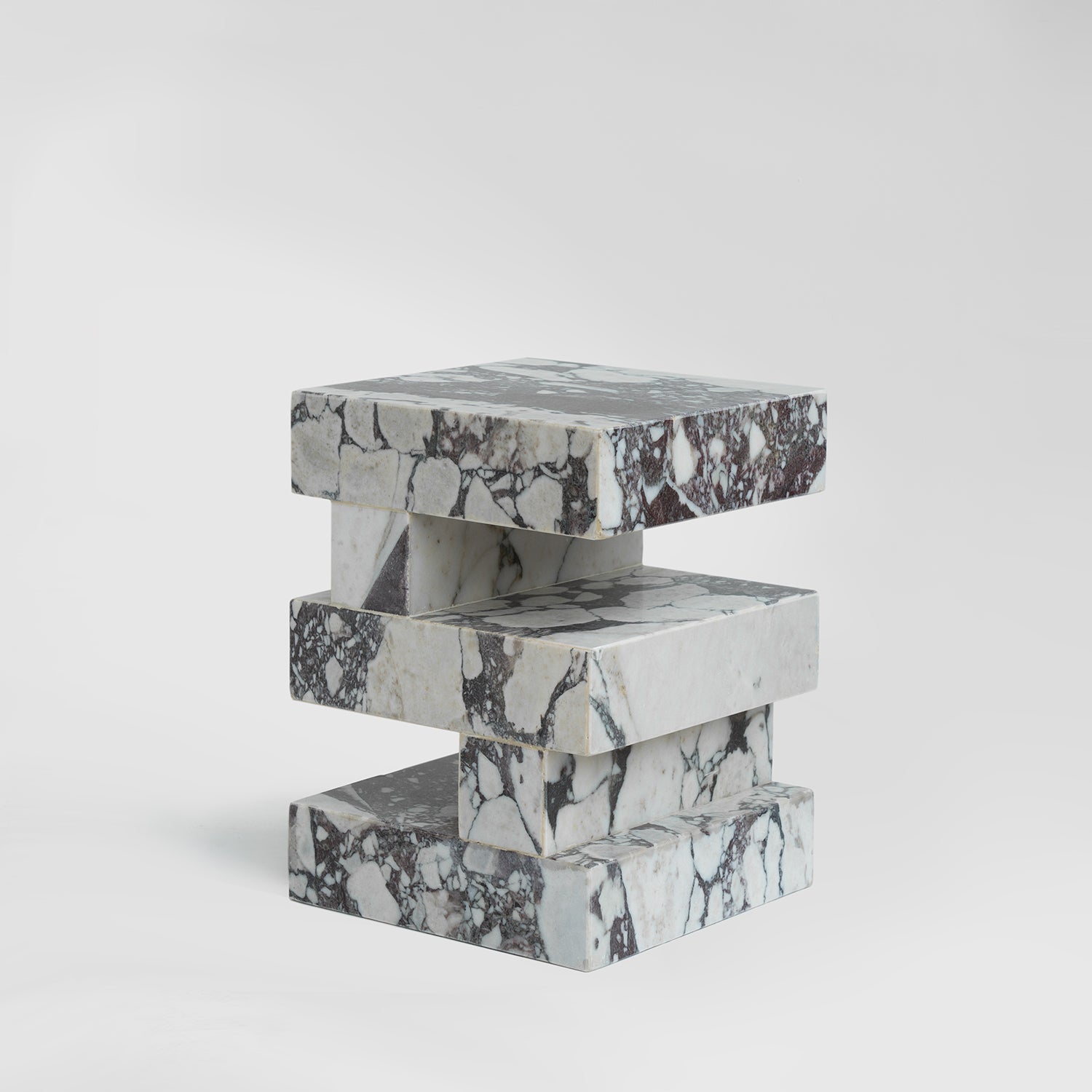 Calacatta marble side table with sculptural zigzag shape