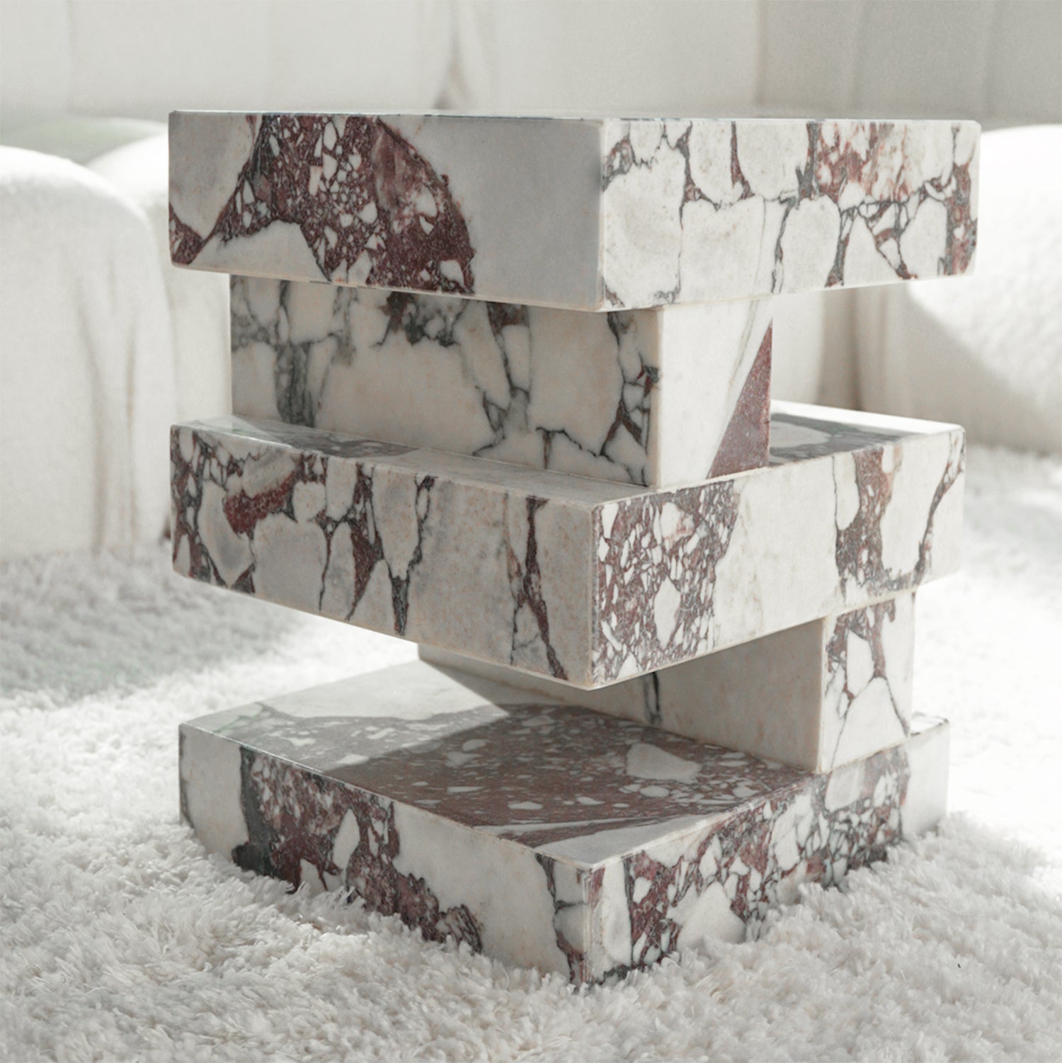 Calacatta marble side table with sculptural zigzag shape