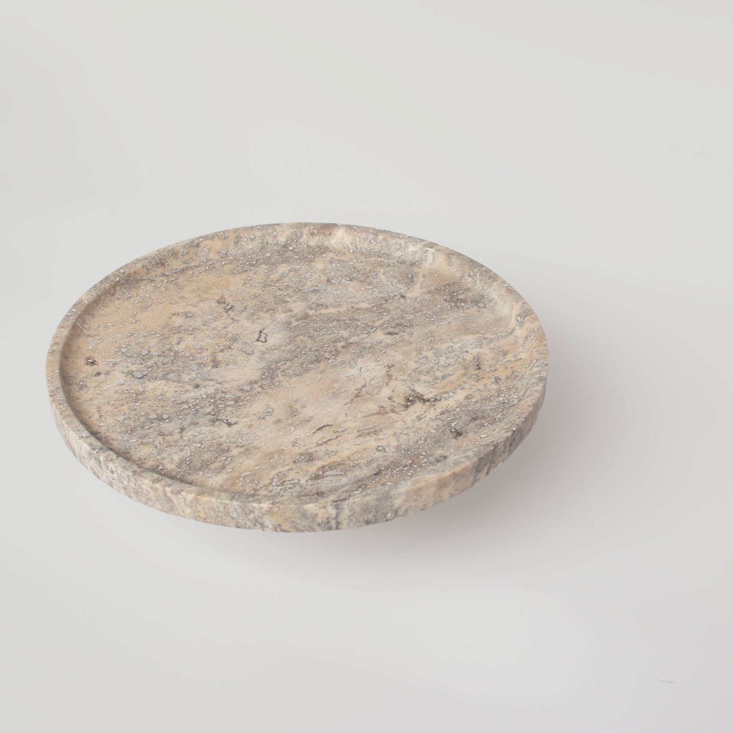 Silver travertine cake stand with round stone base