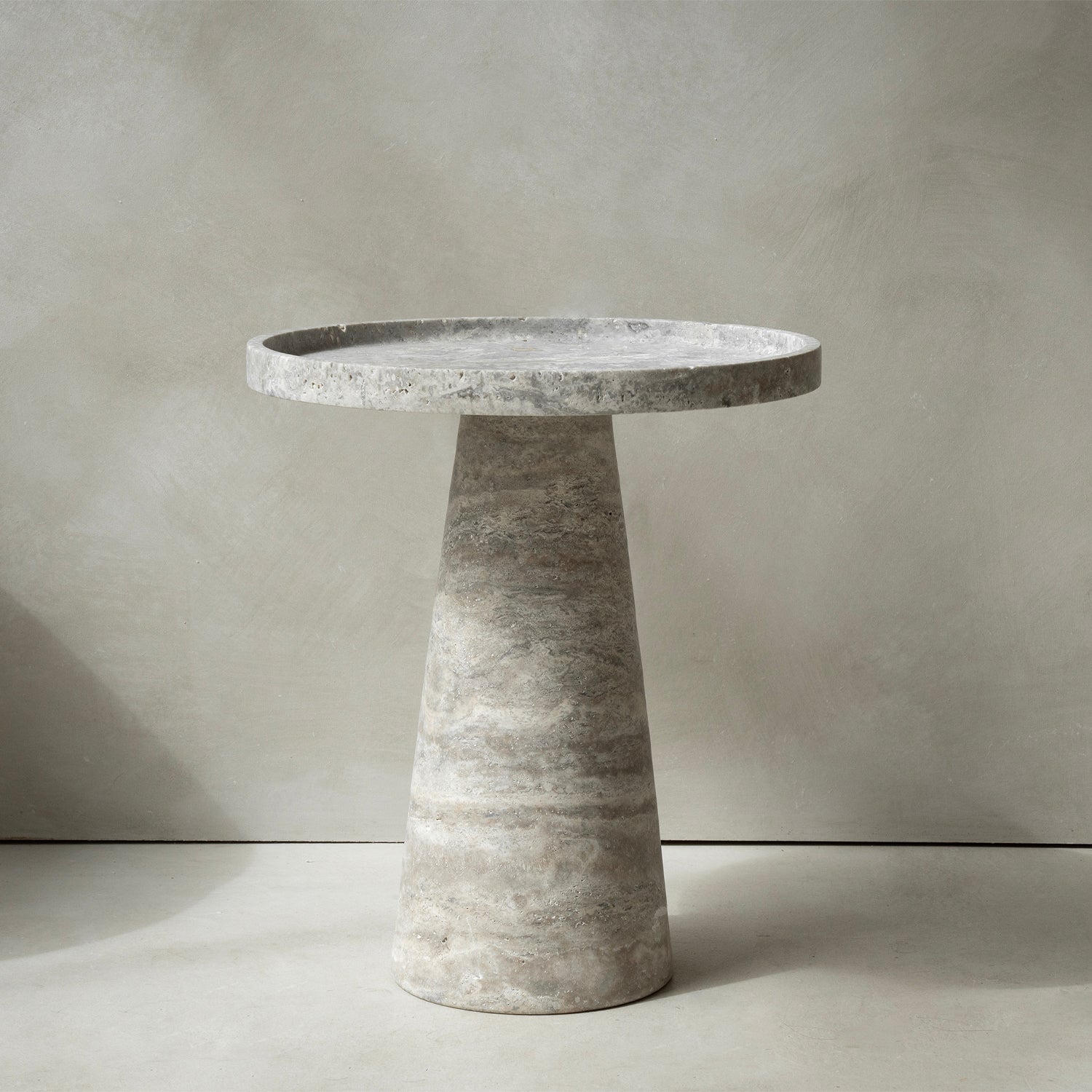 Silver travertine cone side table with polished stone base