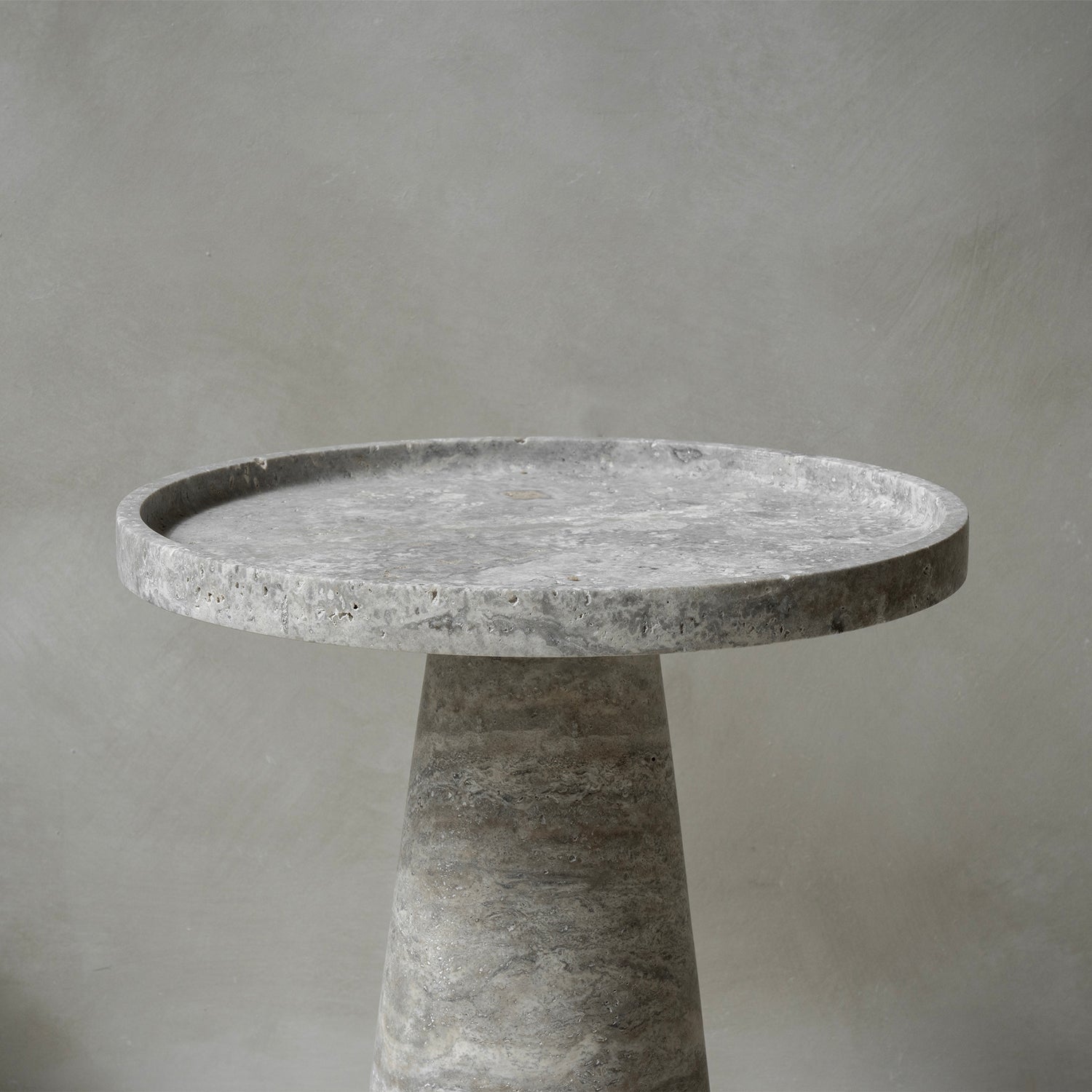 Silver travertine cone side table with polished stone base