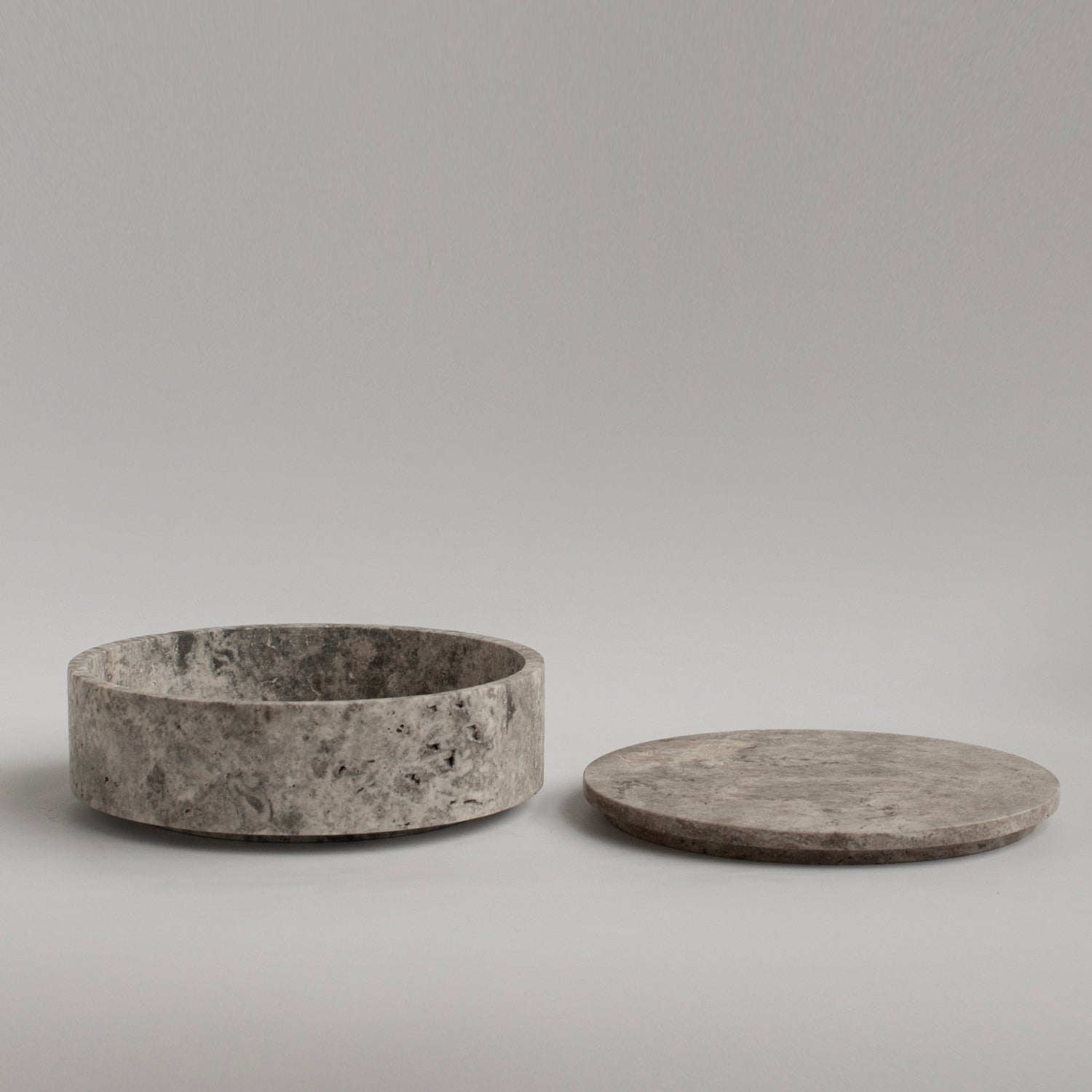 Silver travertine bowl with lid for modern home display