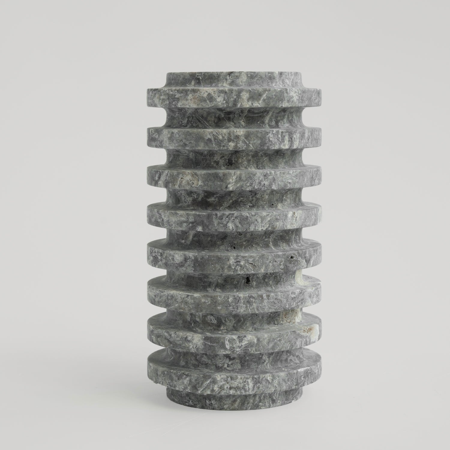 Silver travertine vase with layered natural stone texture