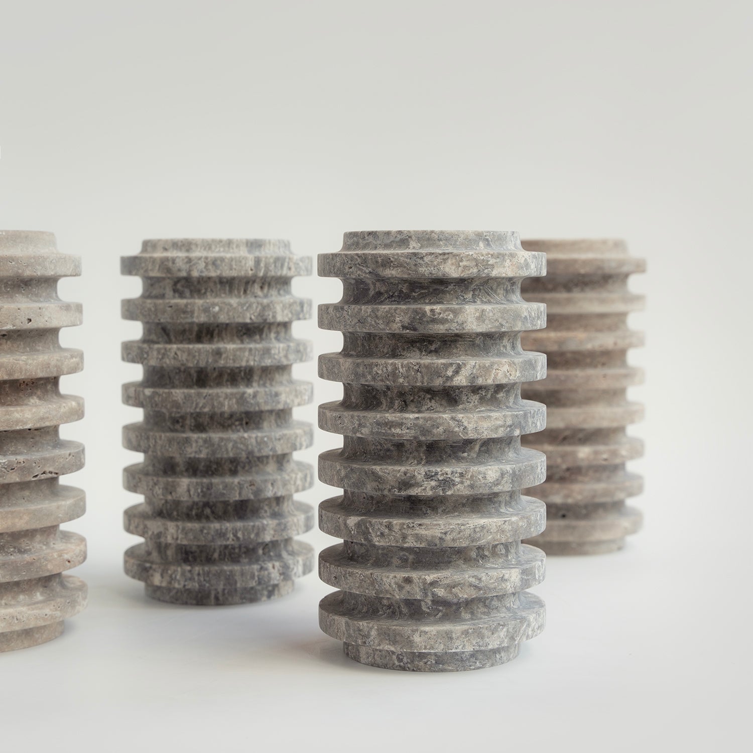 Silver travertine vase with layered natural stone texture