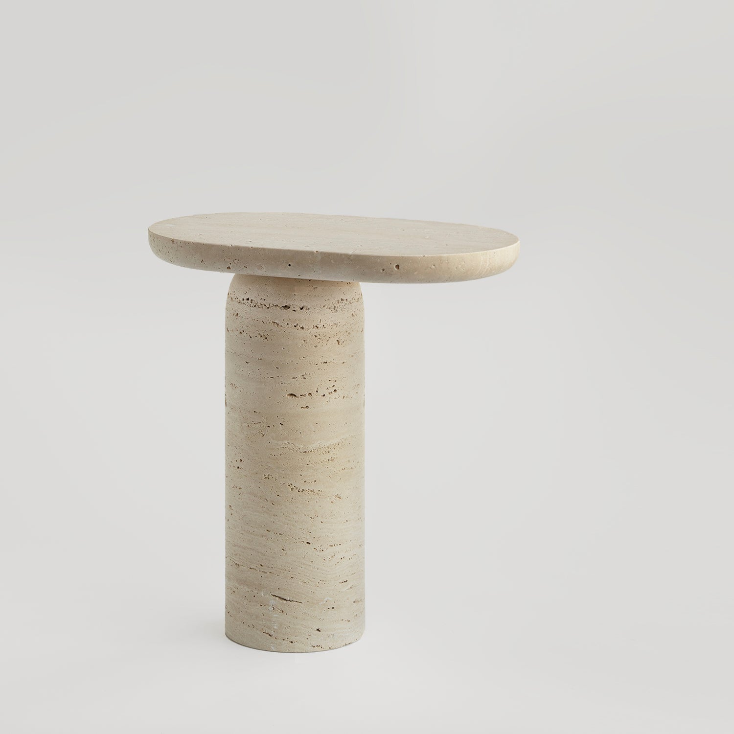 Travertine side table with clean stone finish