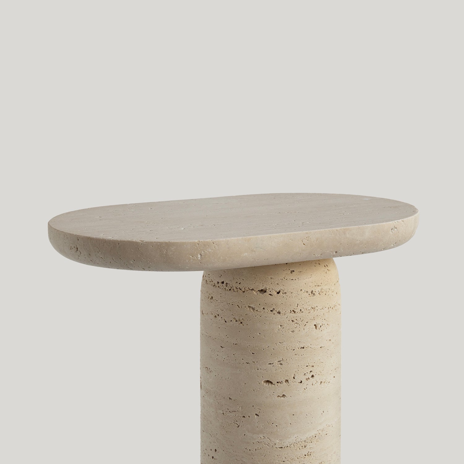 Travertine side table with clean stone finish
