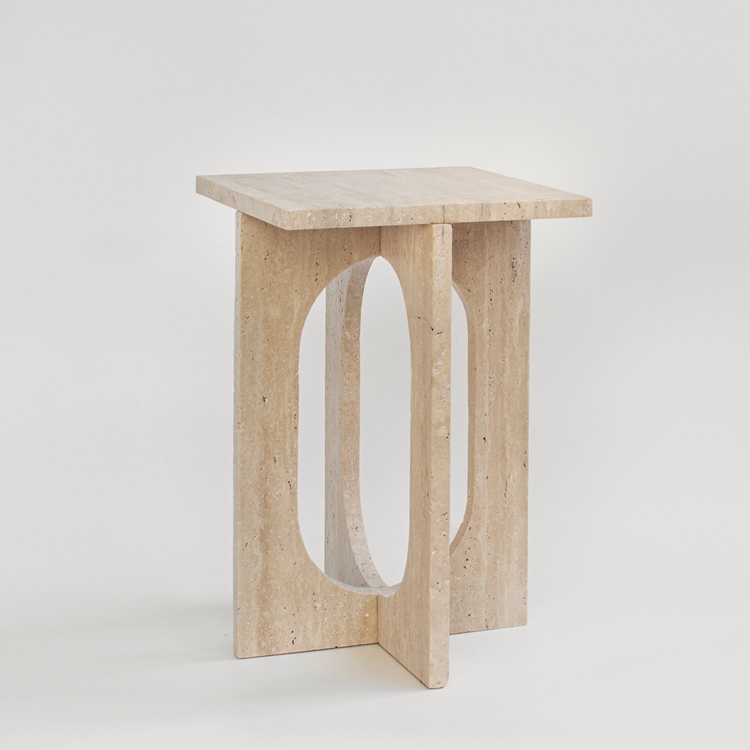 Travertine side table with square top and stone base