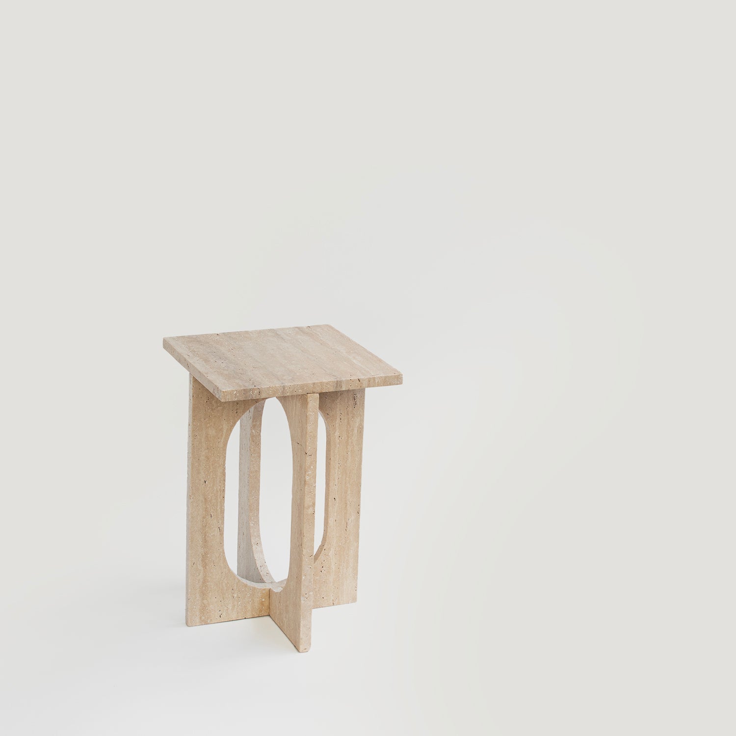 Travertine side table with square top and stone base