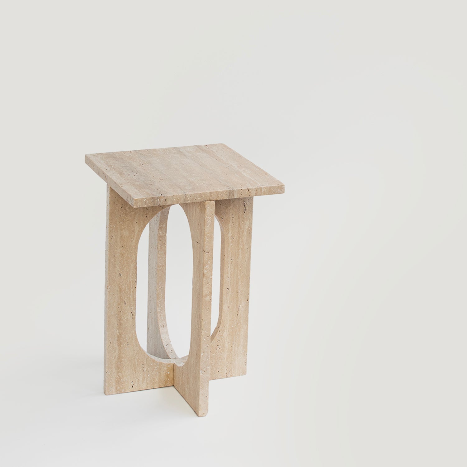 Travertine side table with square top and stone base