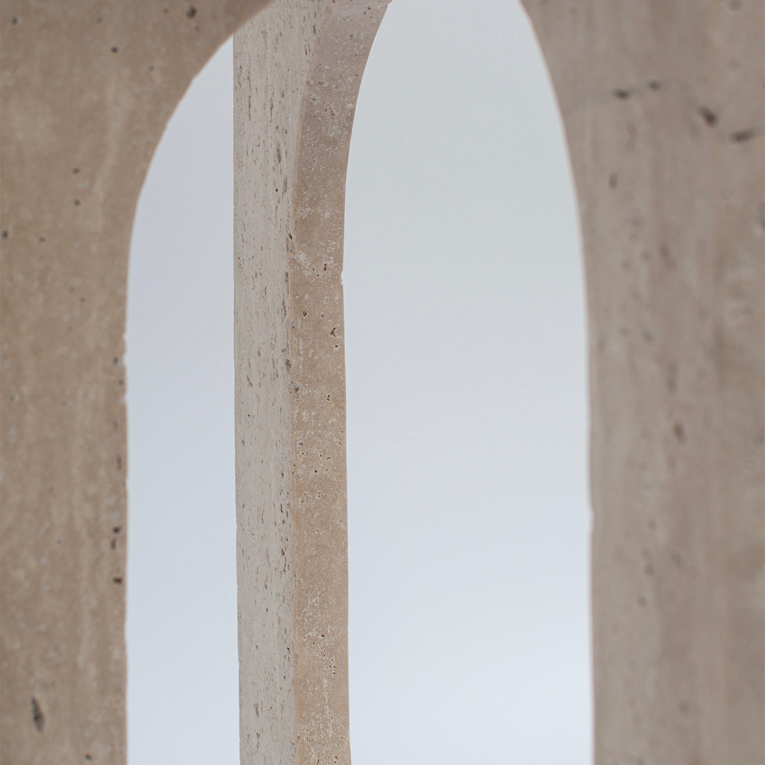 Travertine side table with square top and stone base