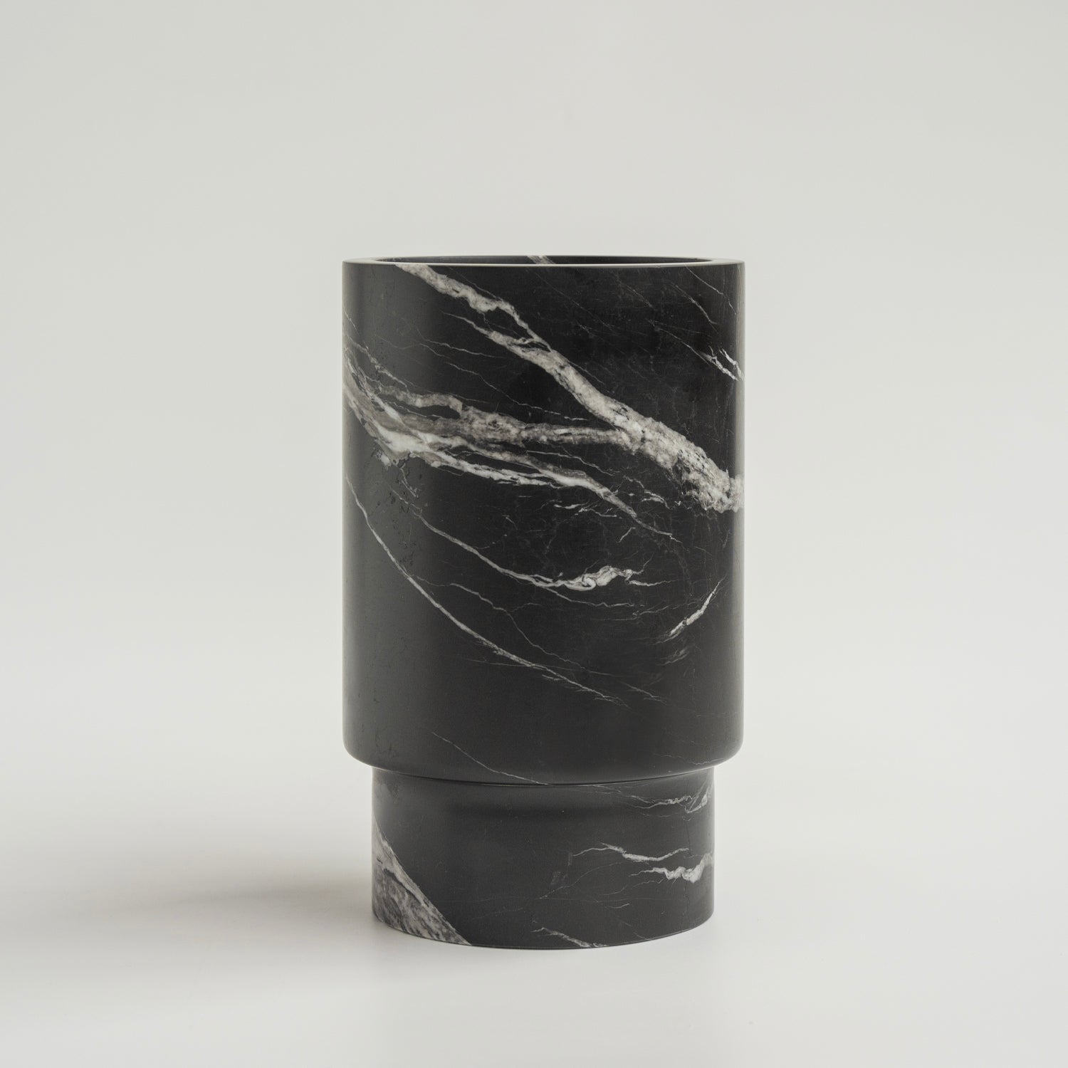 Black marble wine cooler with white veining