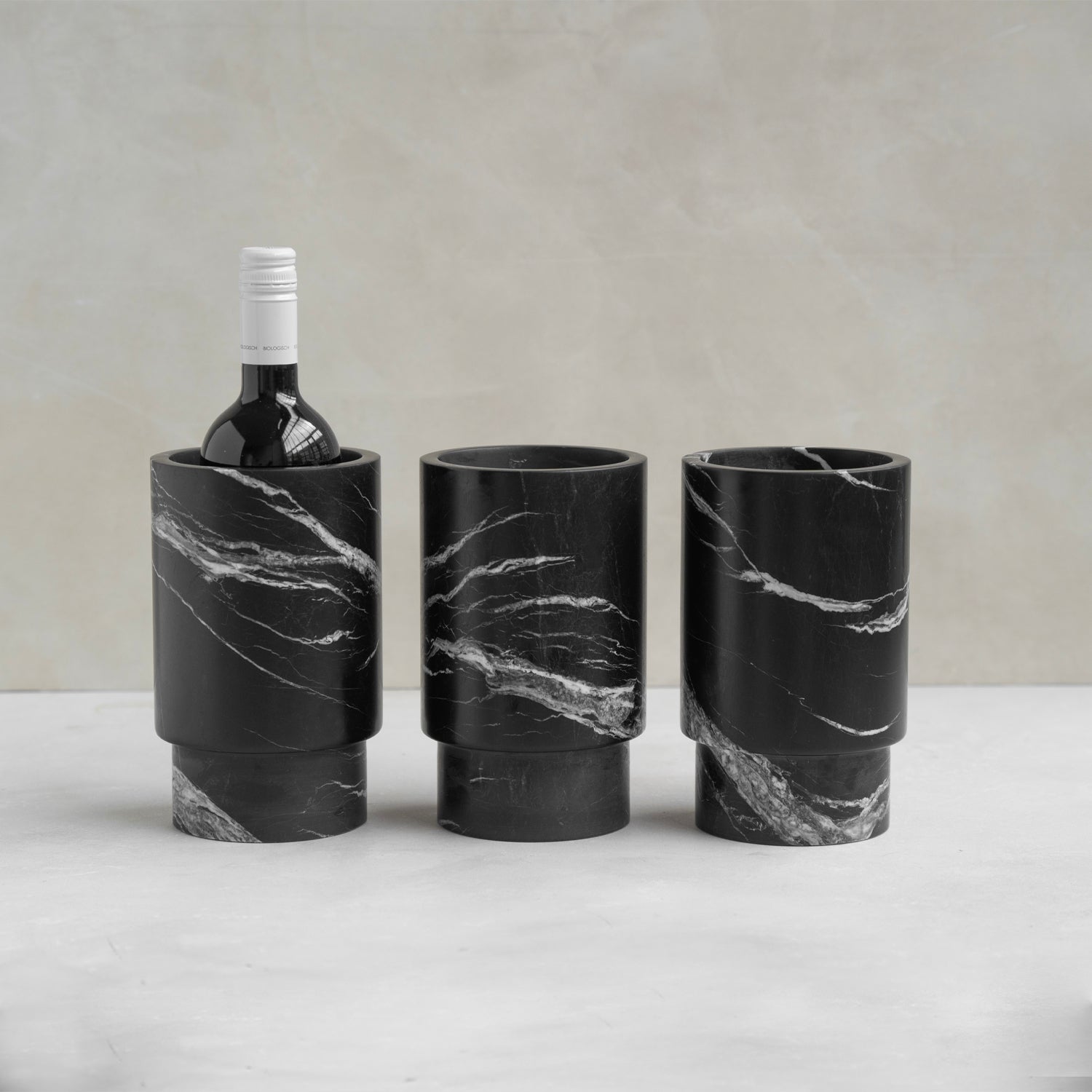 Black marble wine cooler with white veining