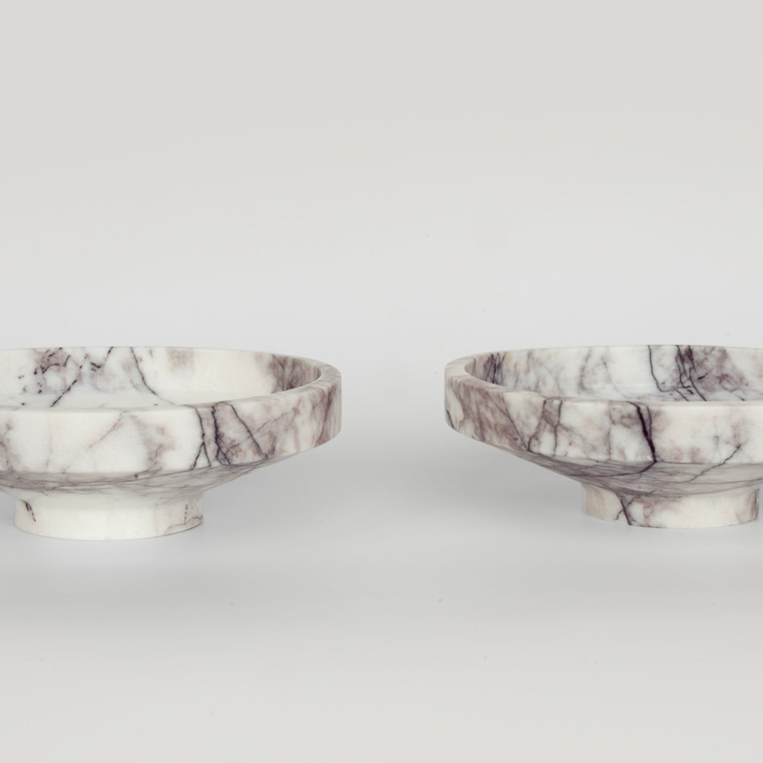 White lilac marble bowl with soft veining on display