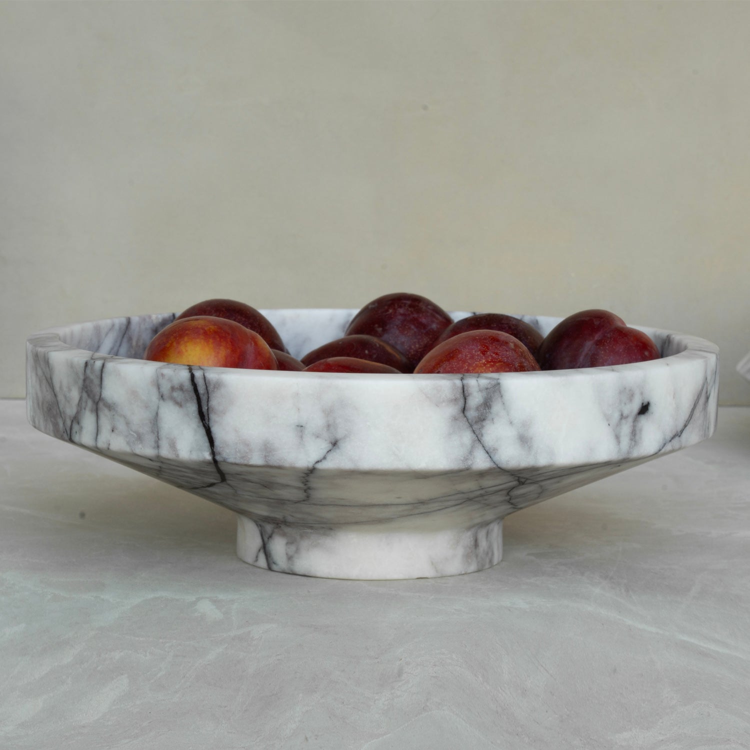 White lilac marble bowl with soft veining on display