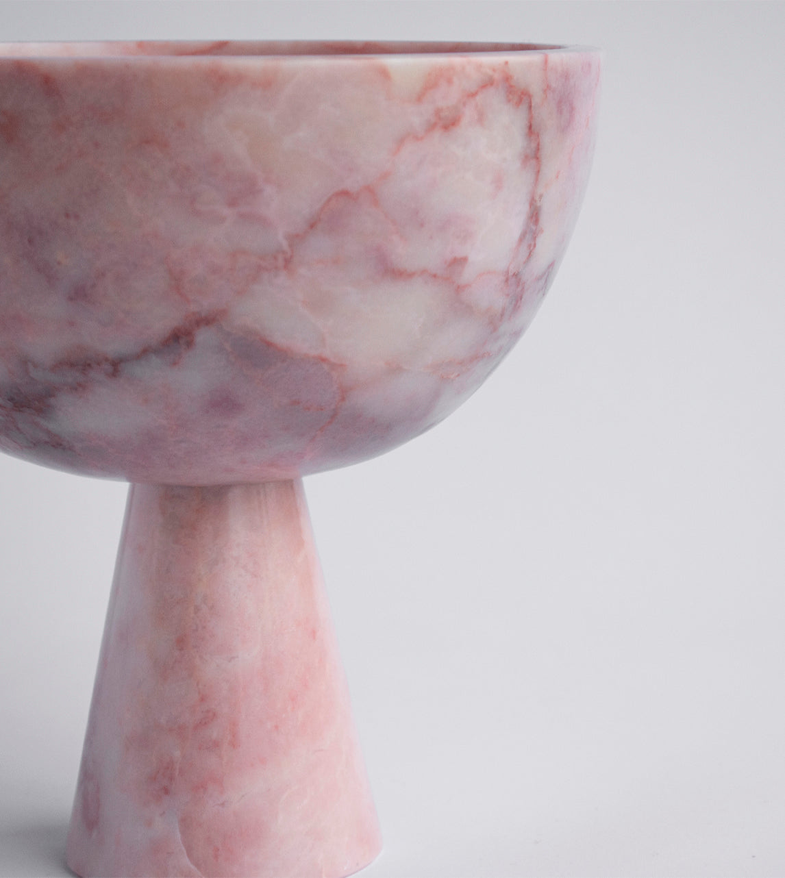 Pink marble pedestal bowl XL with modern curved design