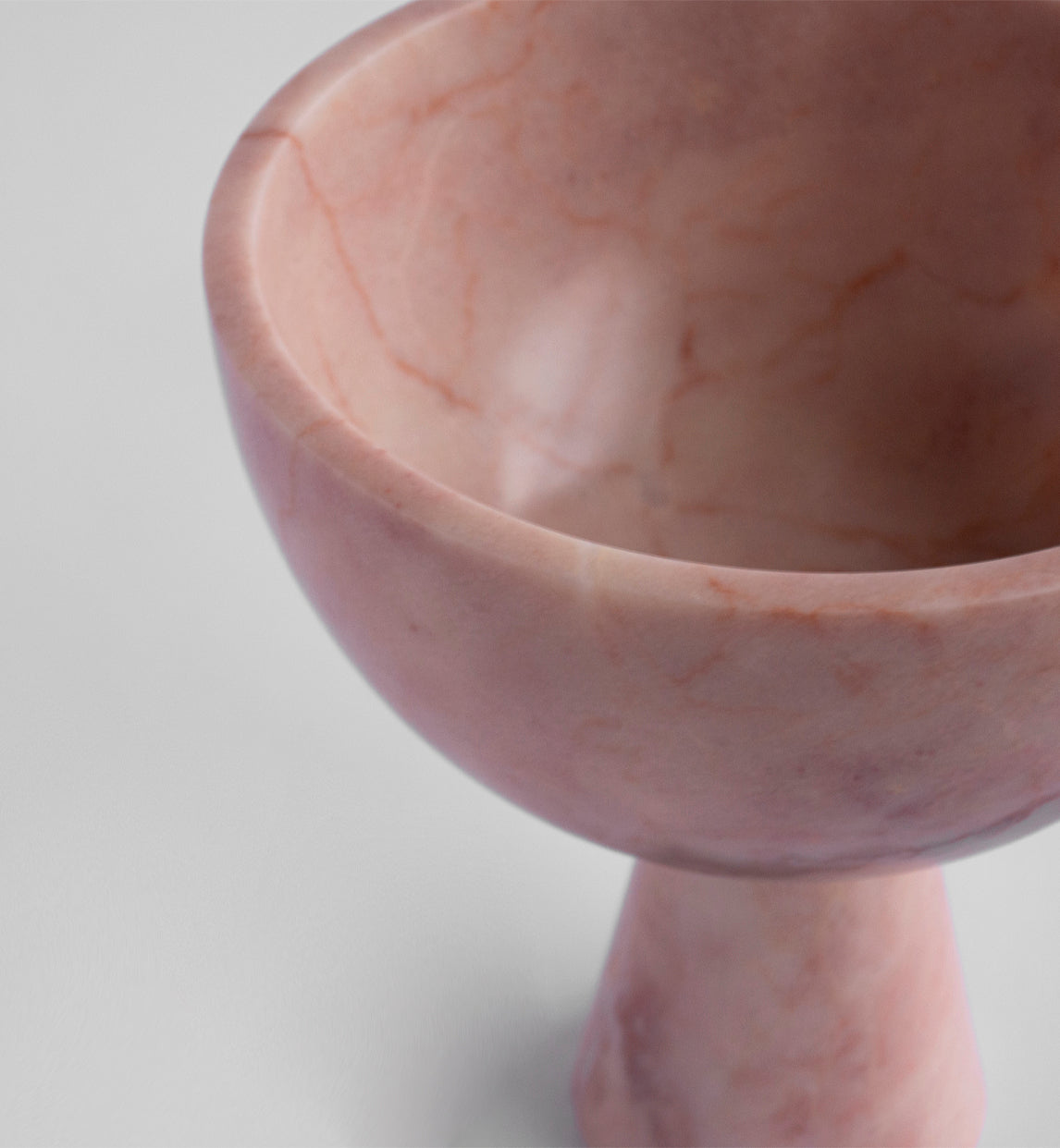 Pink marble pedestal bowl XL with modern curved design