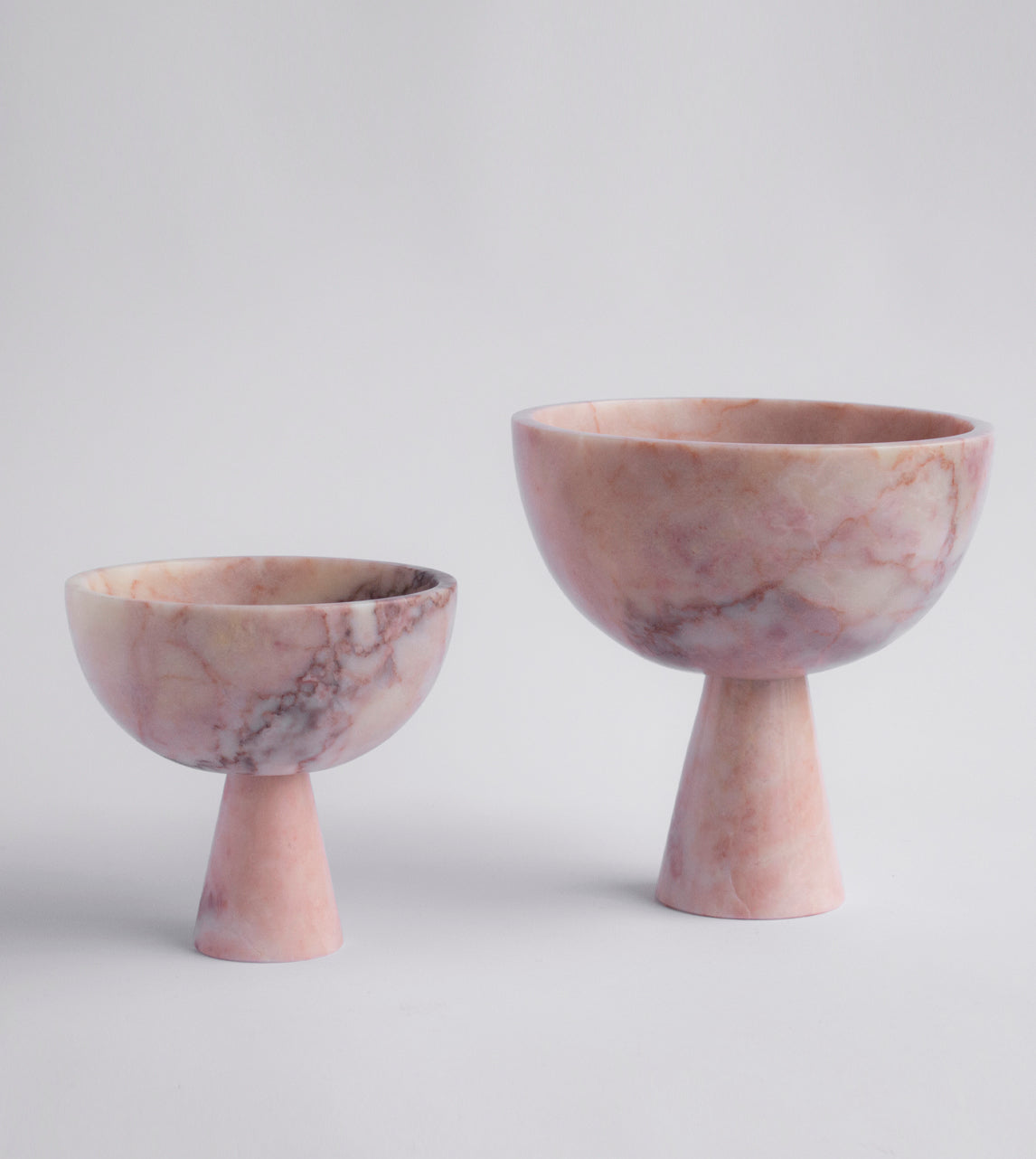 Pink marble pedestal bowl XL with modern curved design