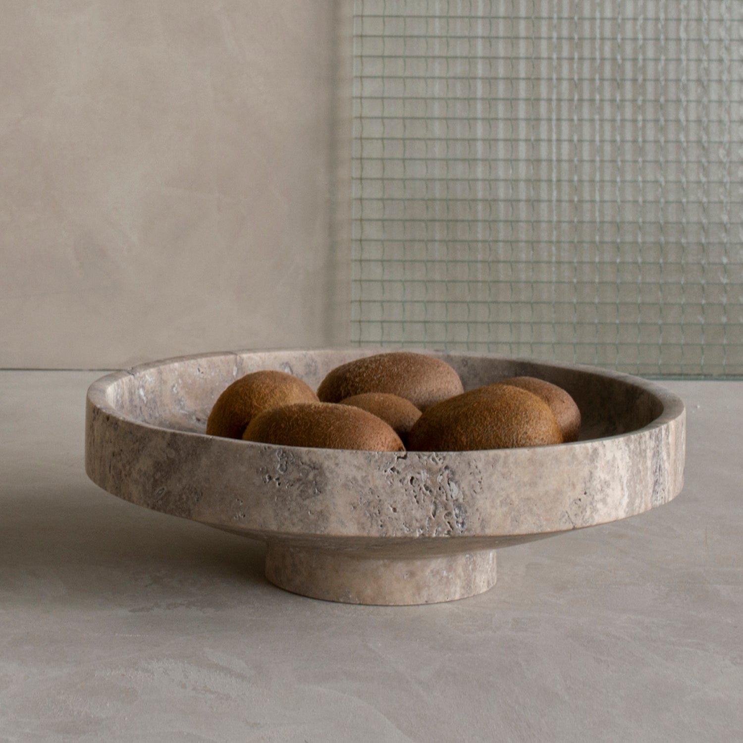 Silver travertine bowl with natural veining detail