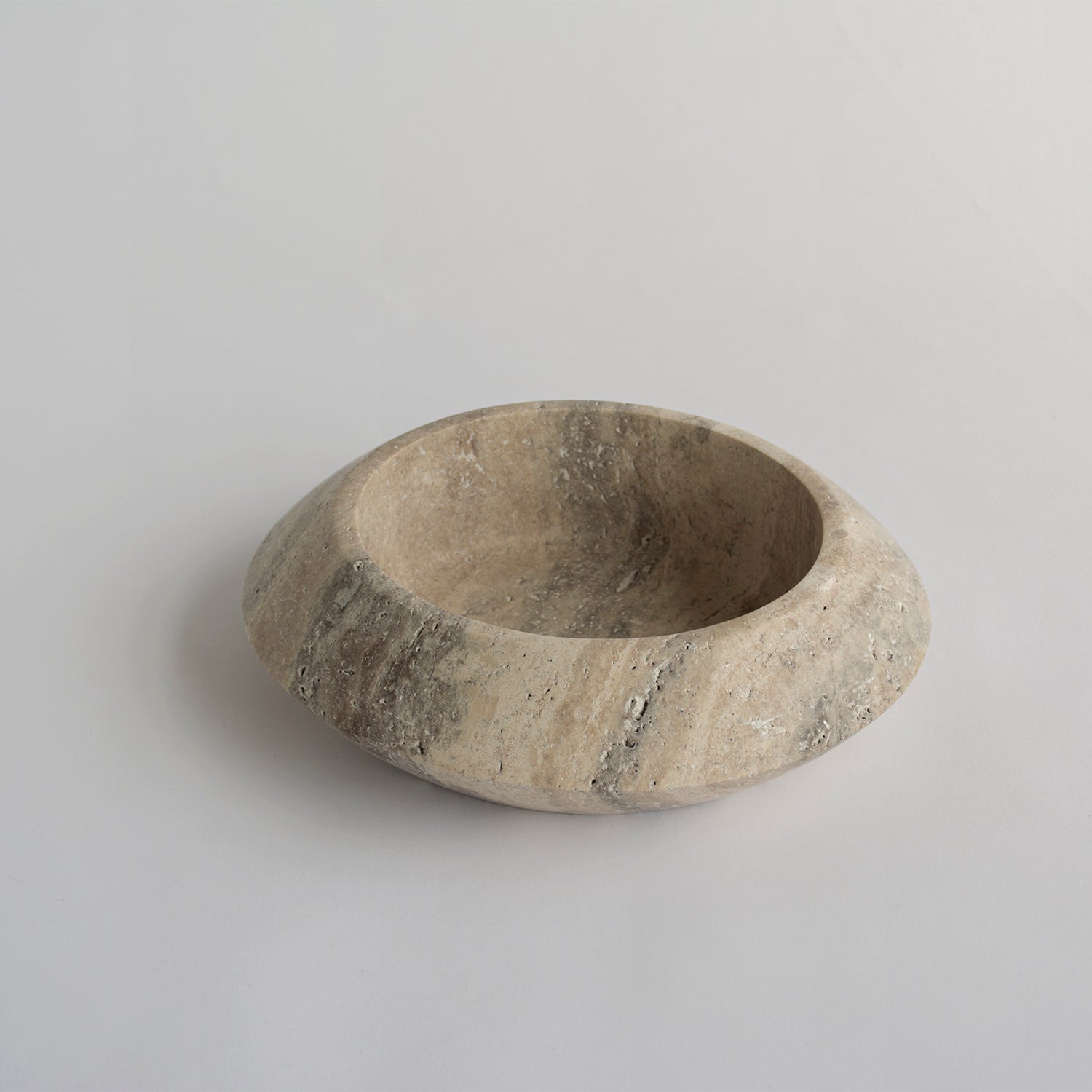 Silver travertine bowl with round sculptural shape