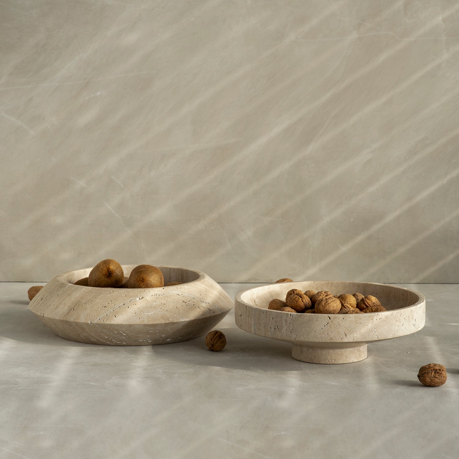 Decorative travertine bowl with natural stone texture