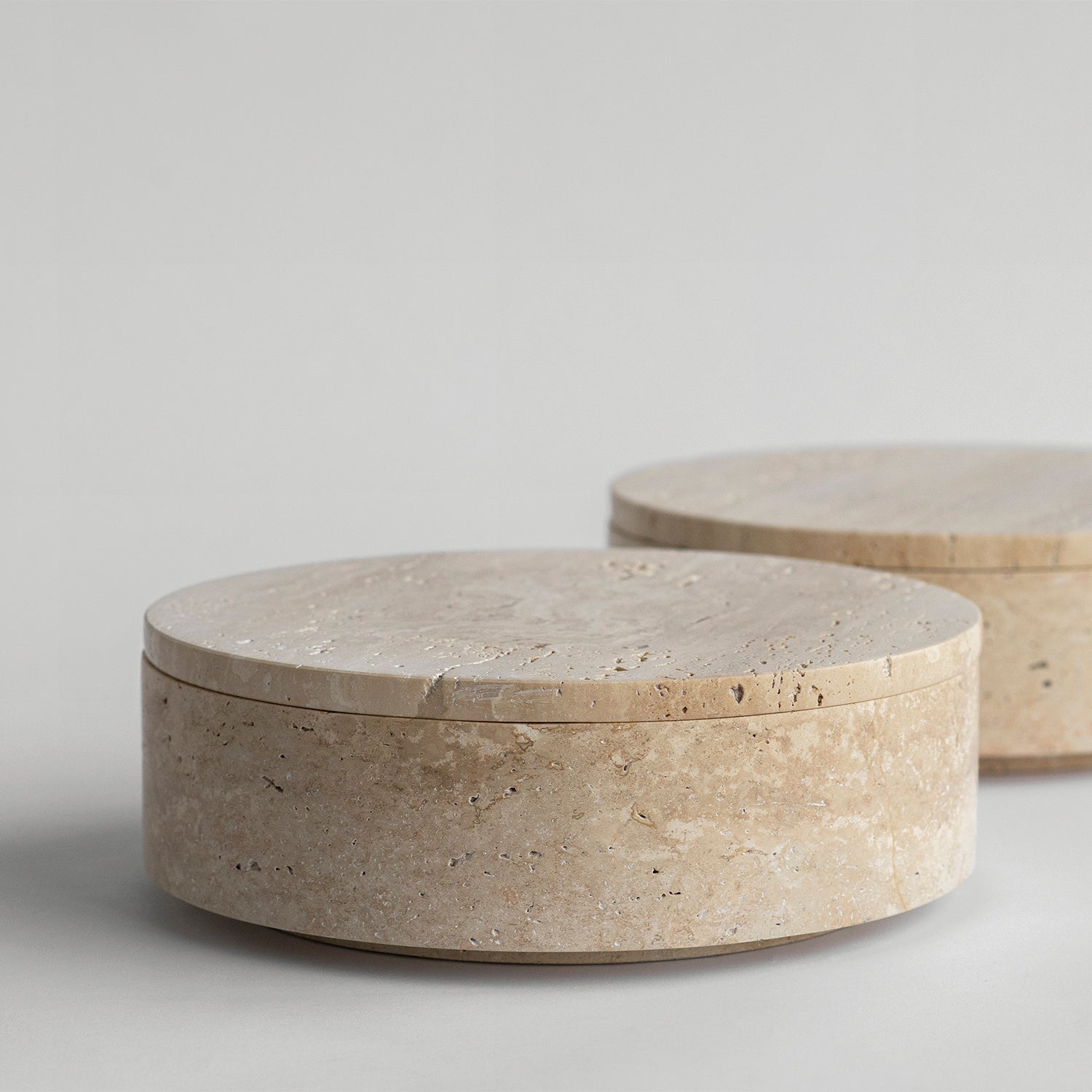 Travertine bowl with lid for shelf or tabletop display