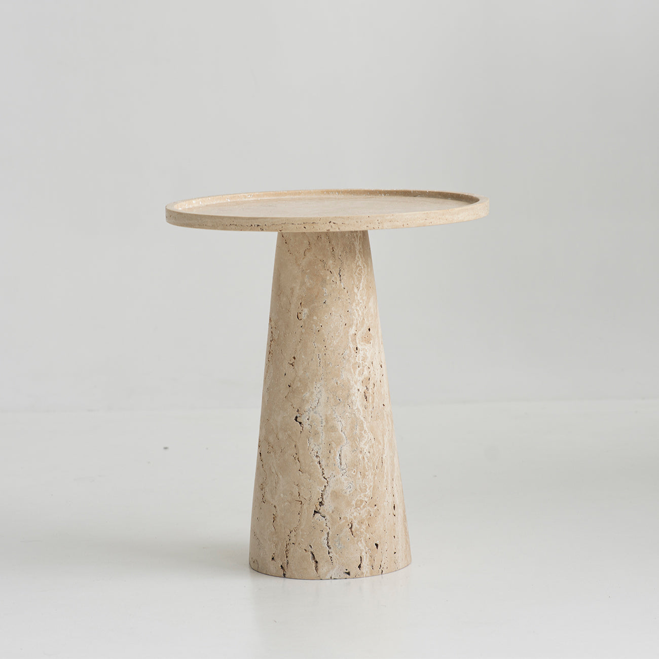 Travertine side table with cone pedestal and round top