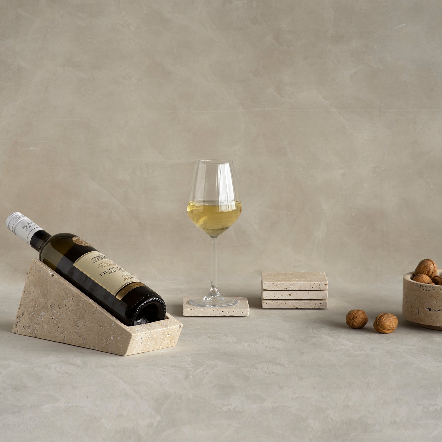 Travertine wine stand with one bottle on display